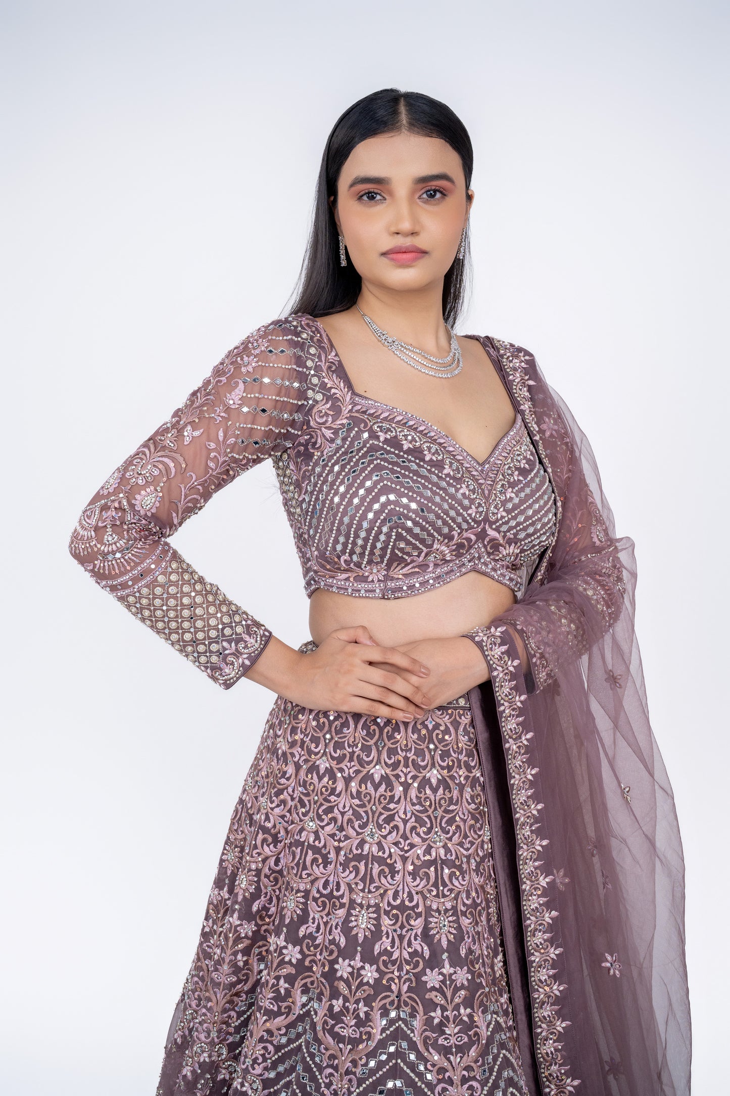 beautiful designer lehenga in light coffee colour.