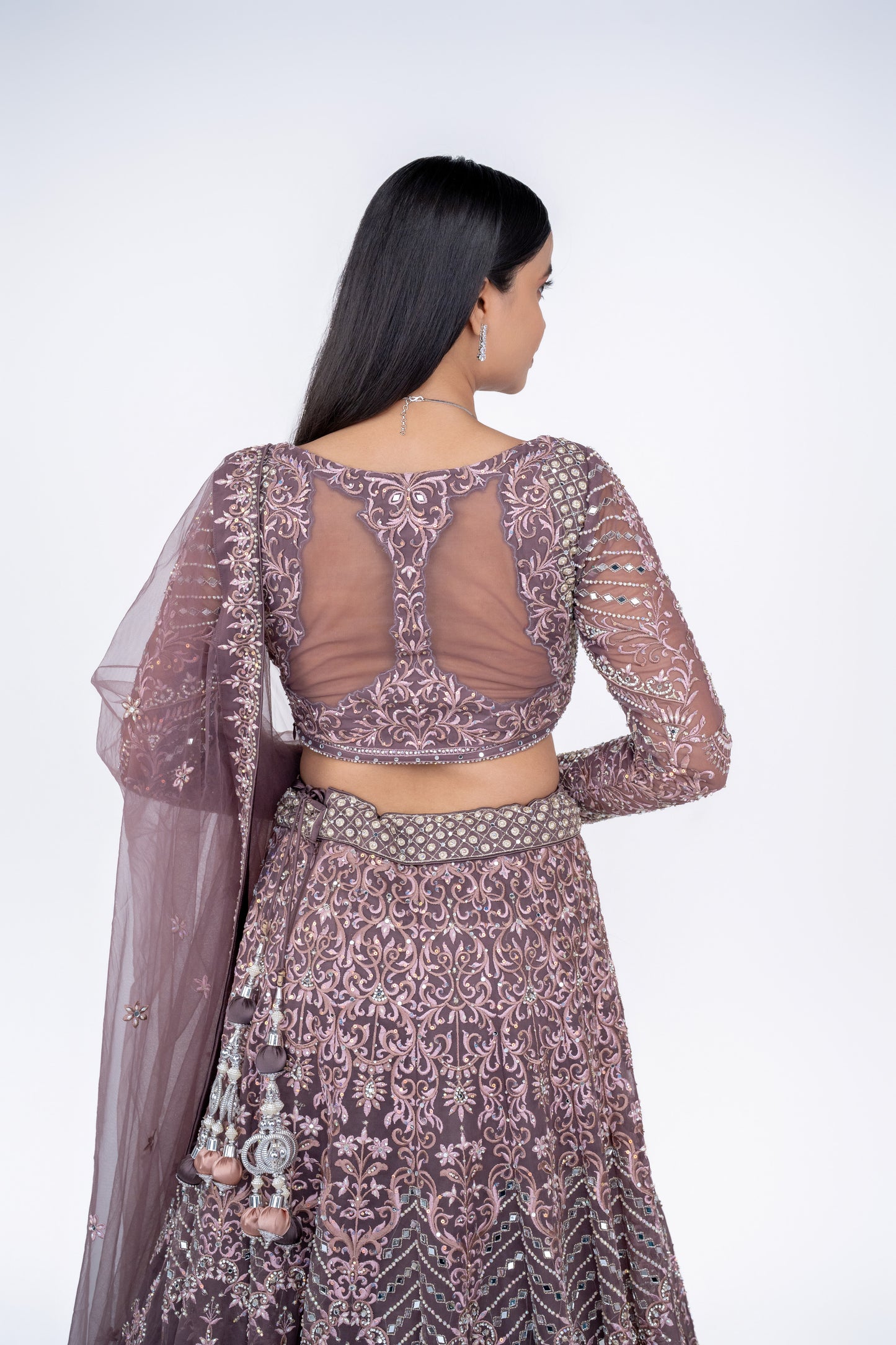 beautiful designer lehenga in light coffee colour.