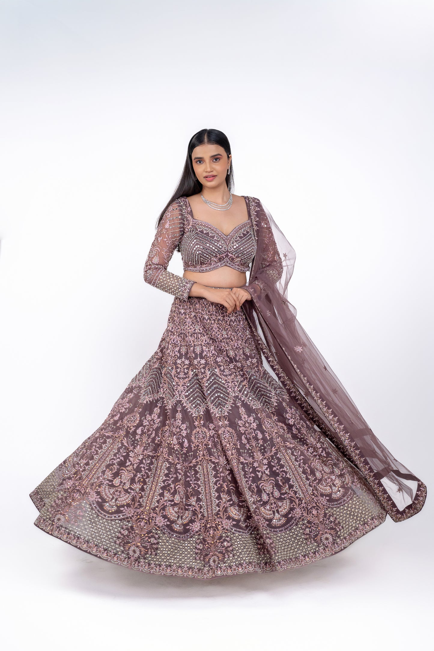 beautiful designer lehenga in light coffee colour.