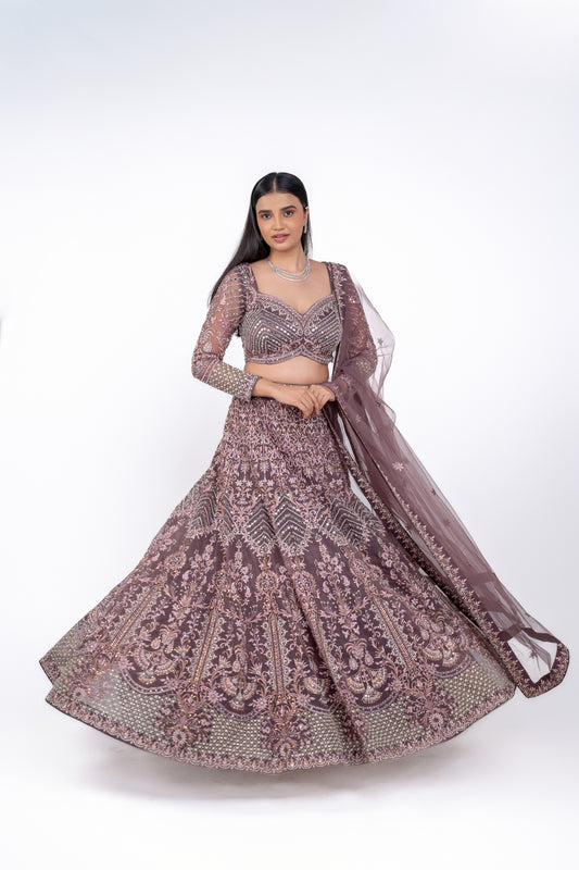beautiful designer lehenga in light coffee colour.