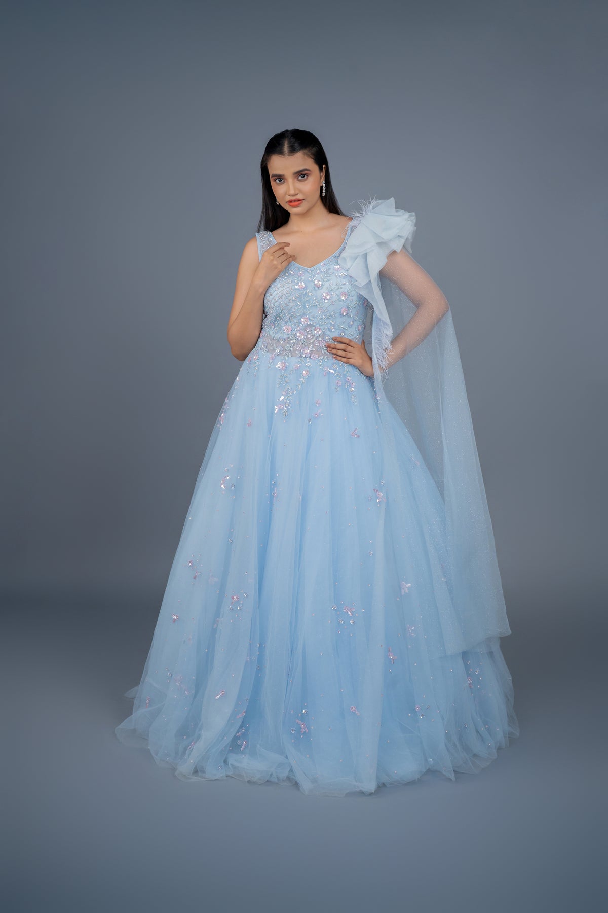 Designer gown in Sky colour with customisation option available.