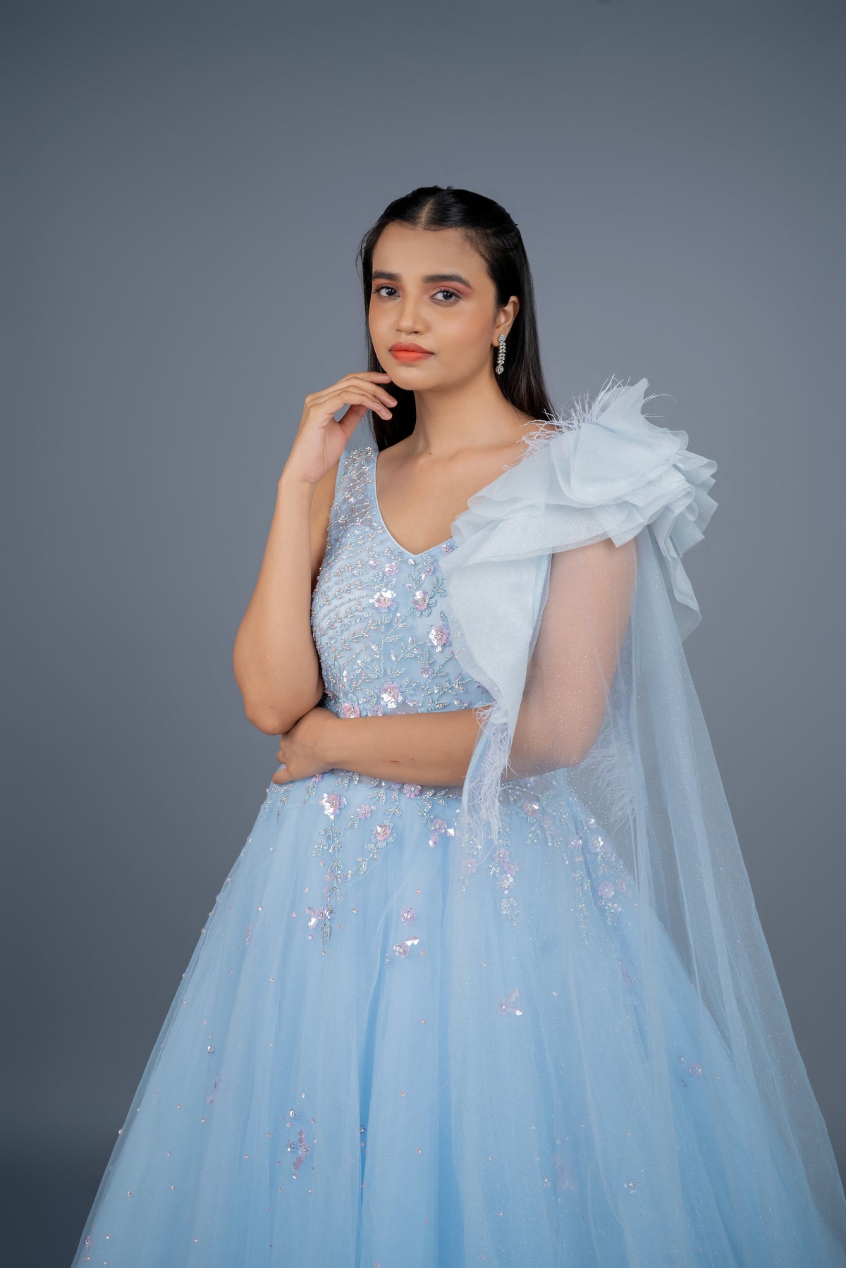 Designer gown in Sky colour with customisation option available.
