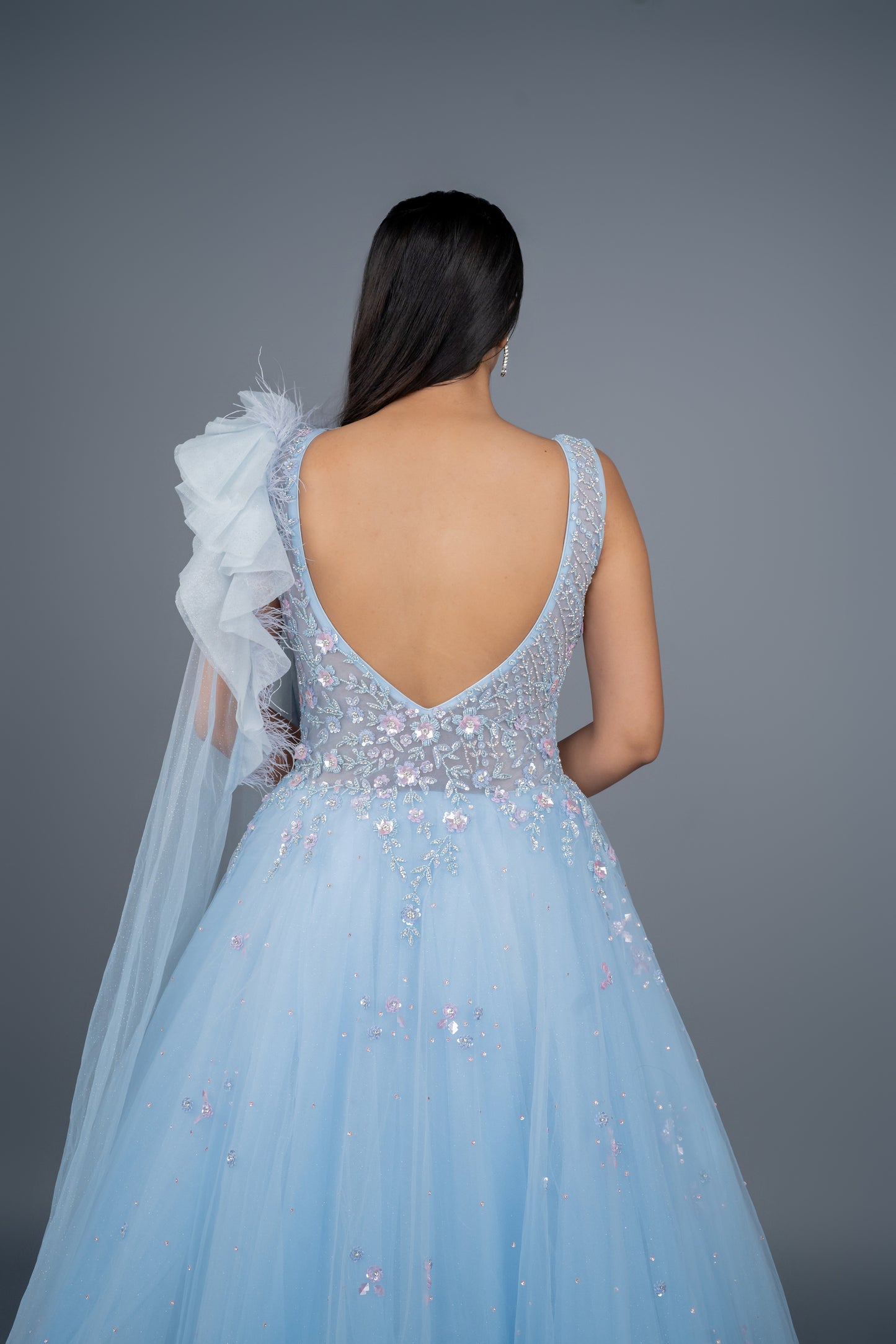 Designer gown in Sky colour with customisation option available.