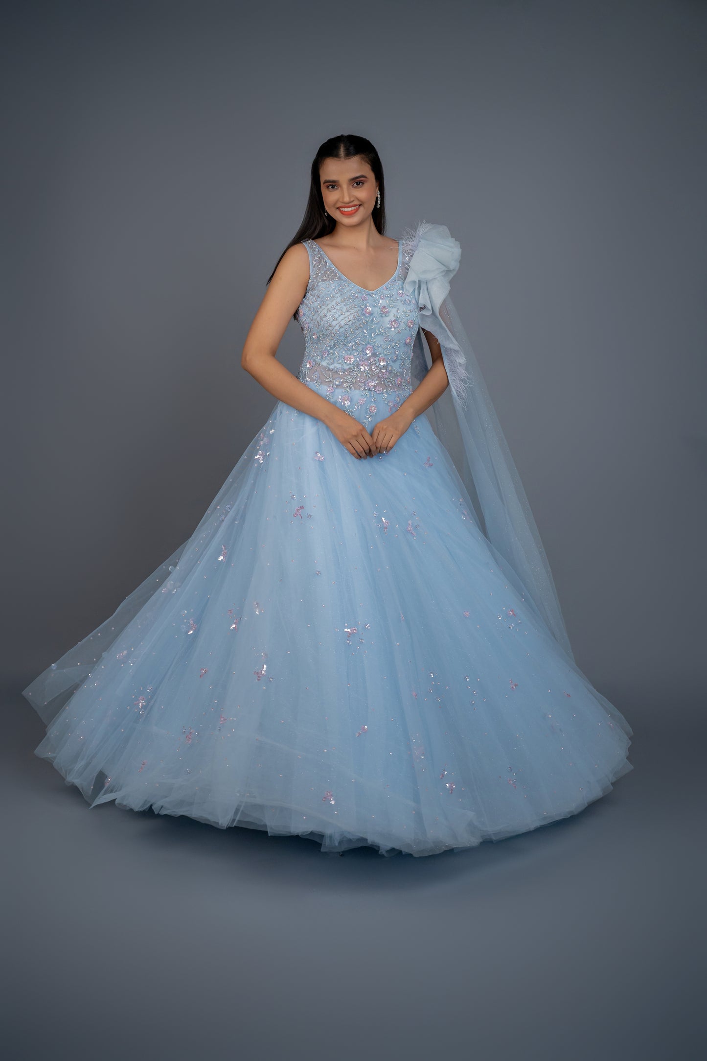 Designer gown in Sky colour with customisation option available.