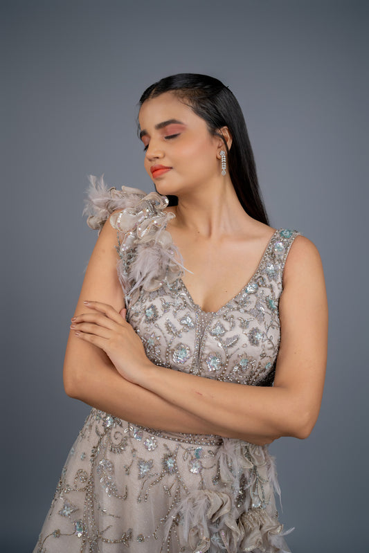 dusly grey handwork gown with feathers touch.