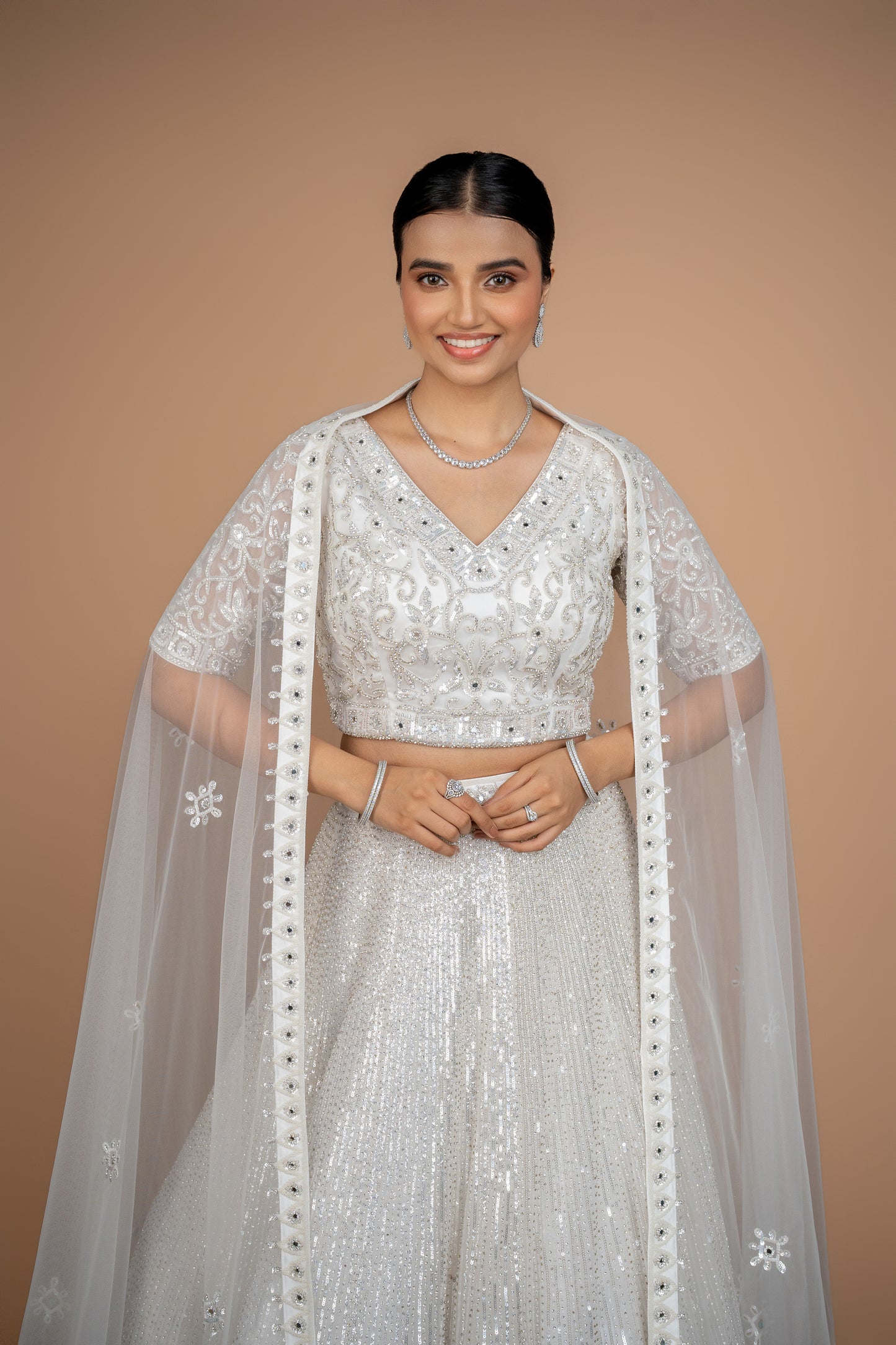 hand work lehenga in white colour and heavy border.