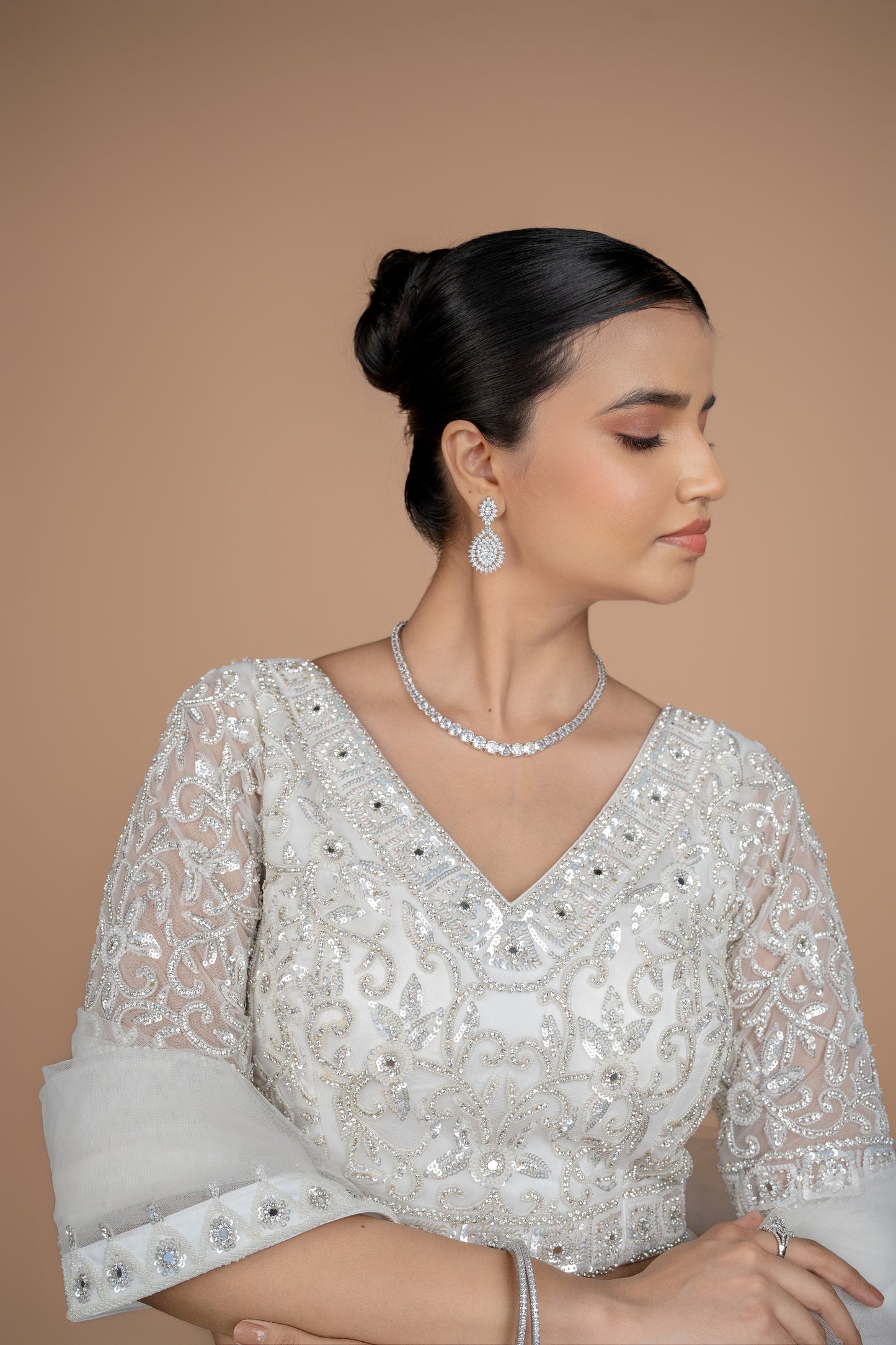 hand work lehenga in white colour and heavy border.