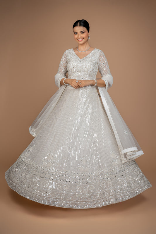 hand work lehenga in white colour and heavy border.