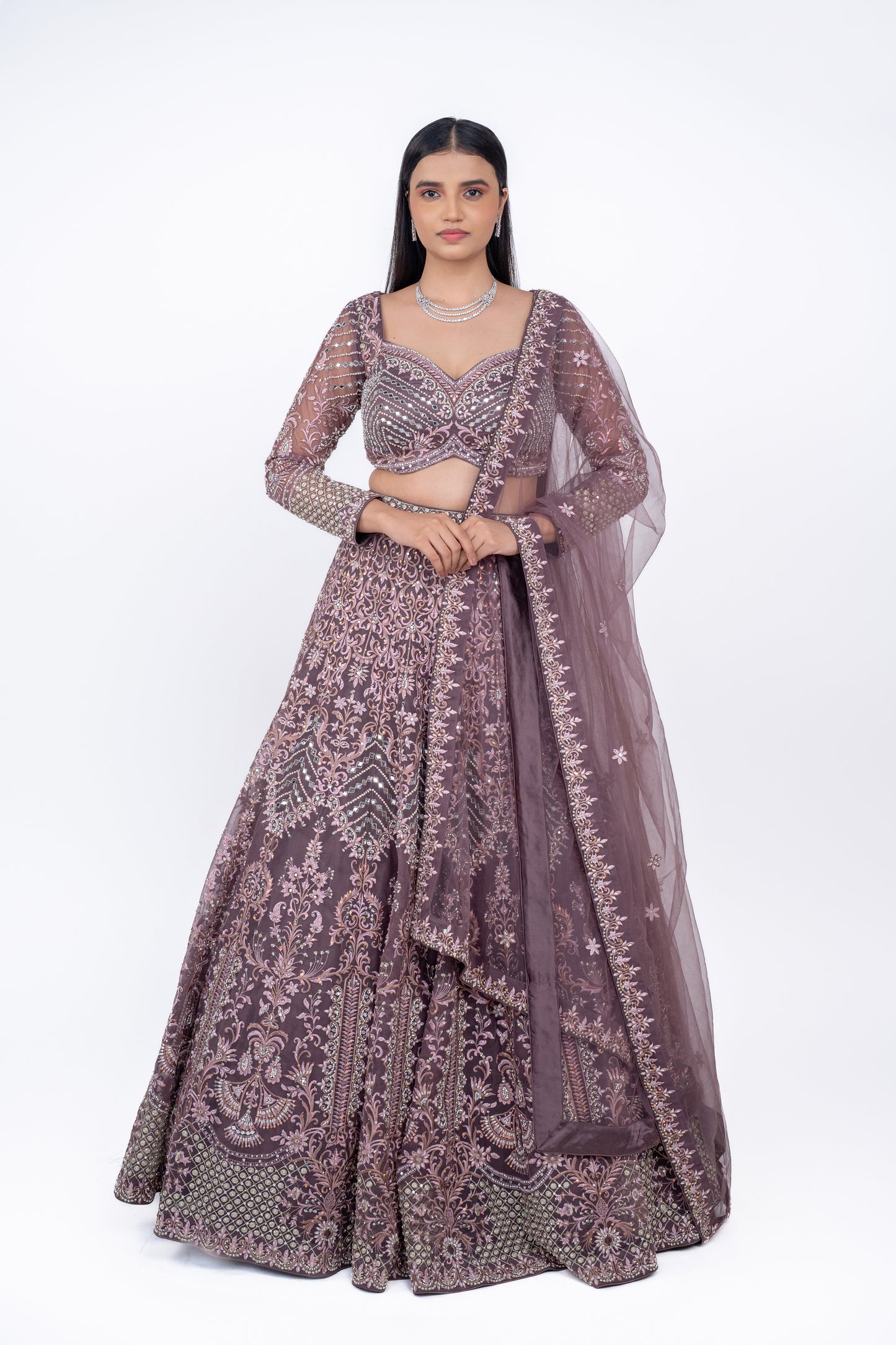 beautiful designer lehenga in light coffee colour.