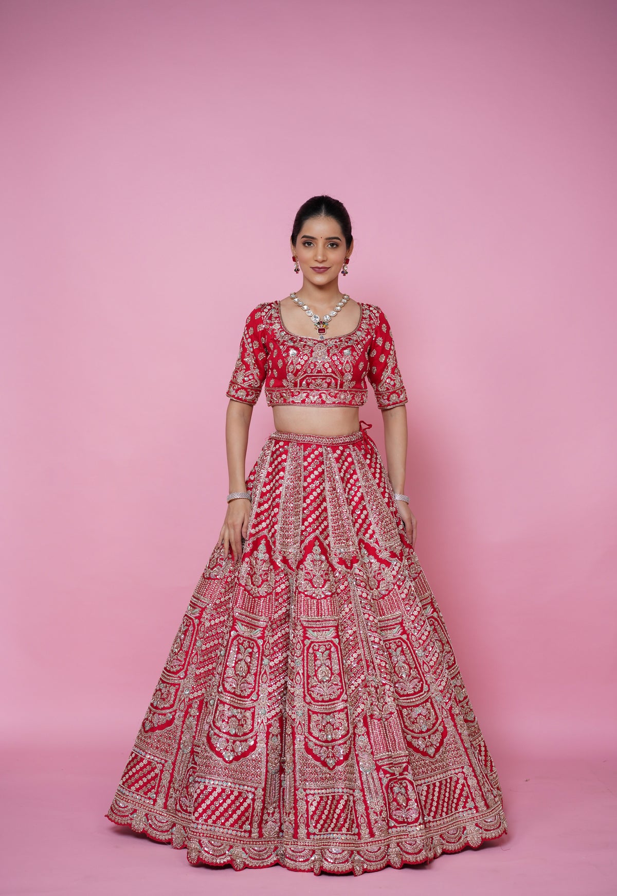 red silk fabric zardoshi lehenga.