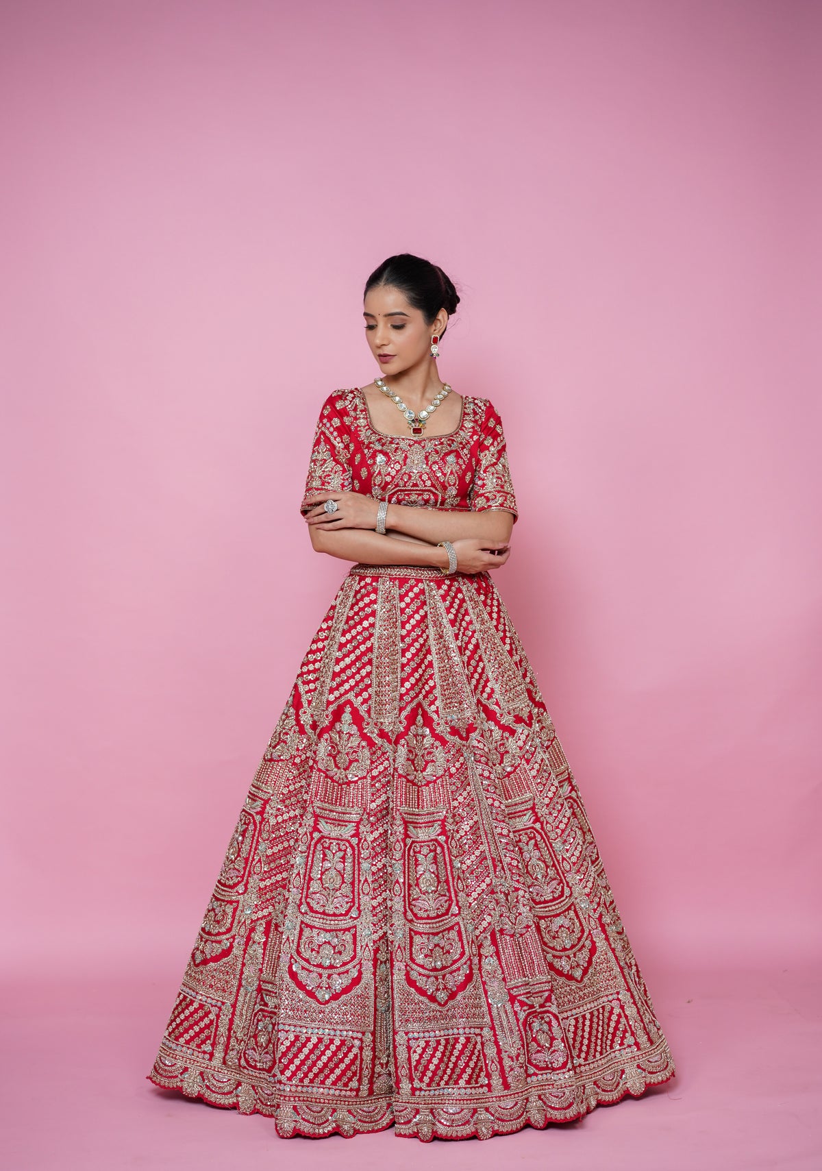 red silk fabric zardoshi lehenga.