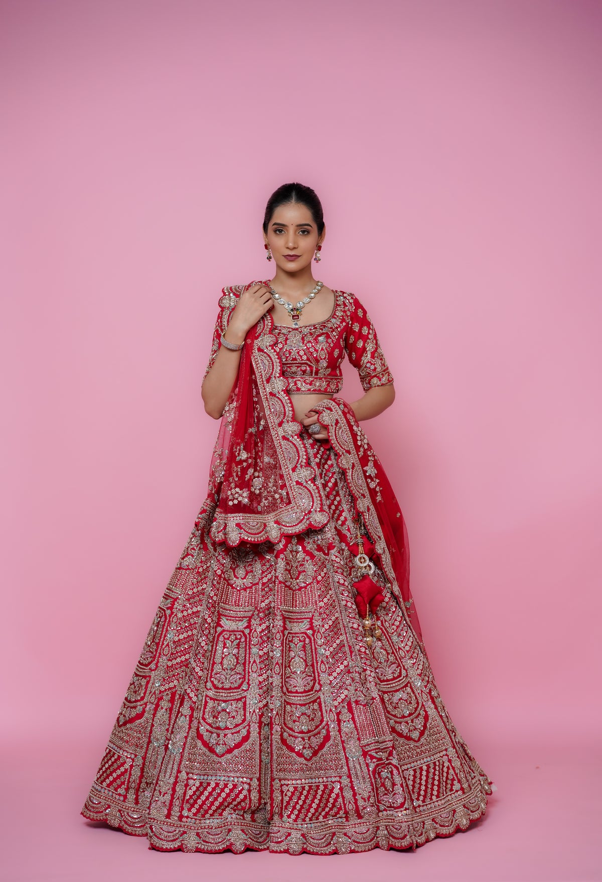 red silk fabric zardoshi lehenga.