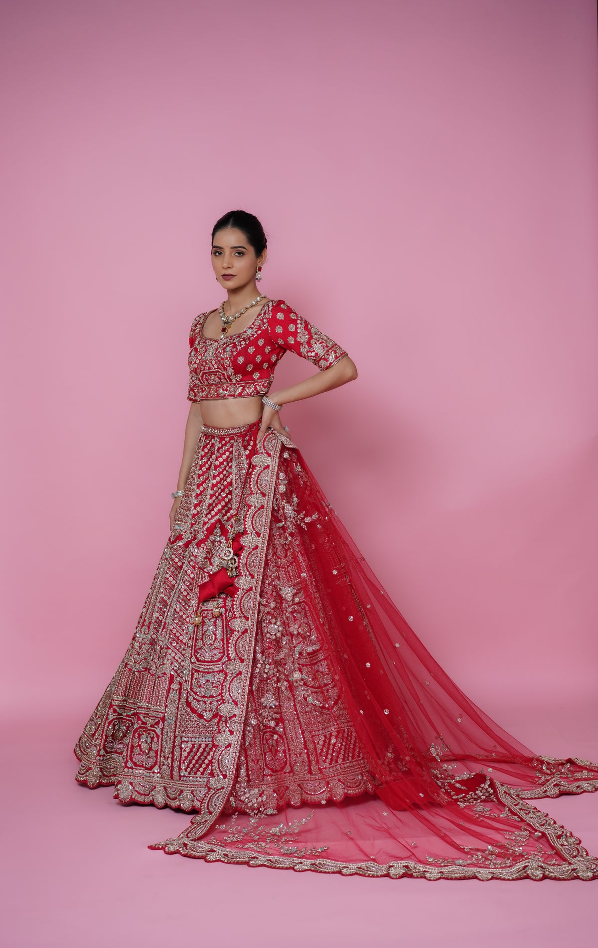 red silk fabric zardoshi lehenga.