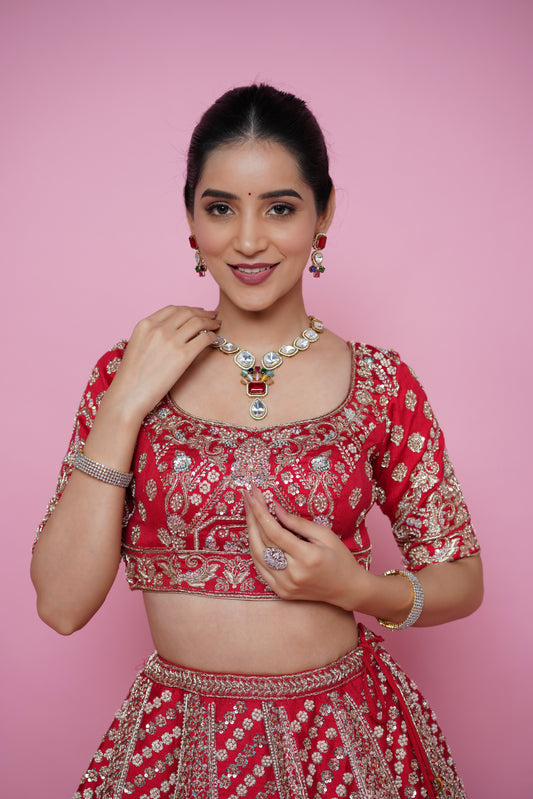 red silk fabric zardoshi lehenga.