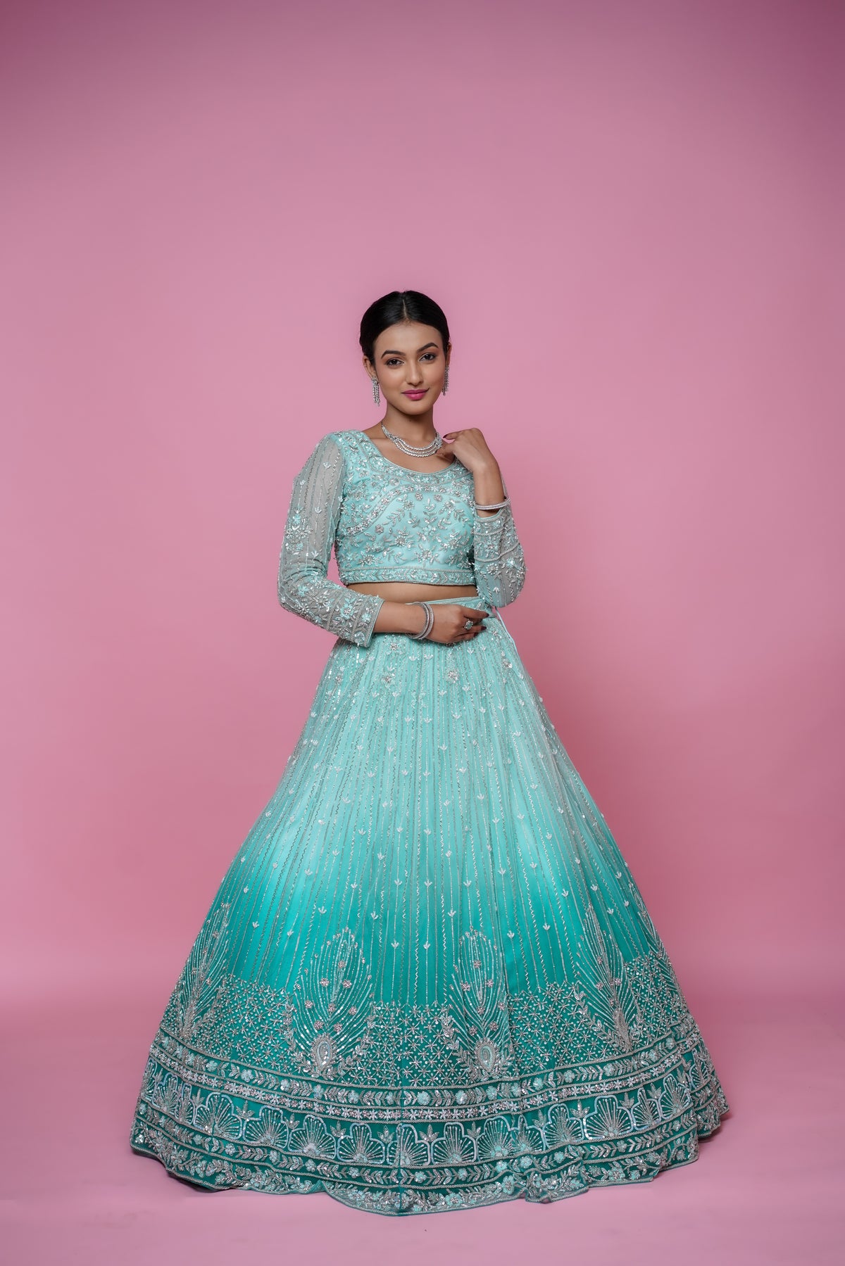 ombre green lehenga with handwork.