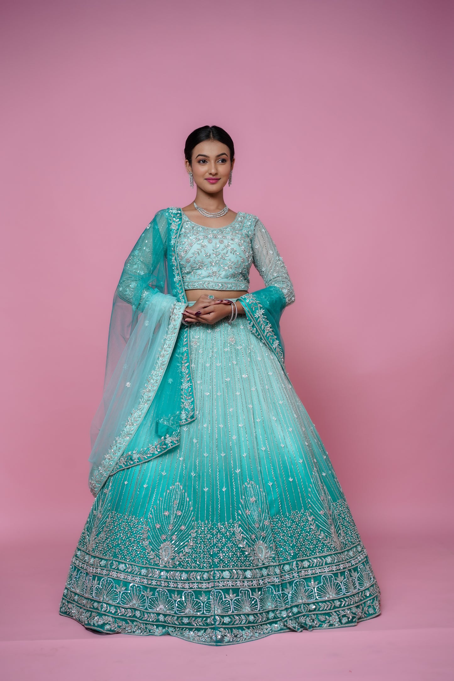 ombre green lehenga with handwork.