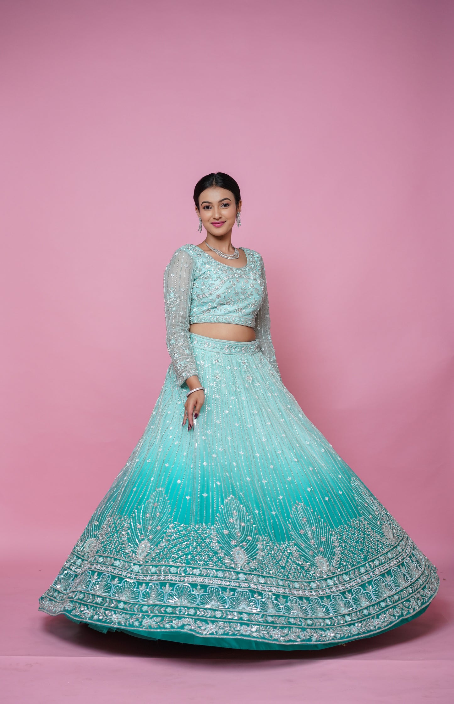 ombre green lehenga with handwork.