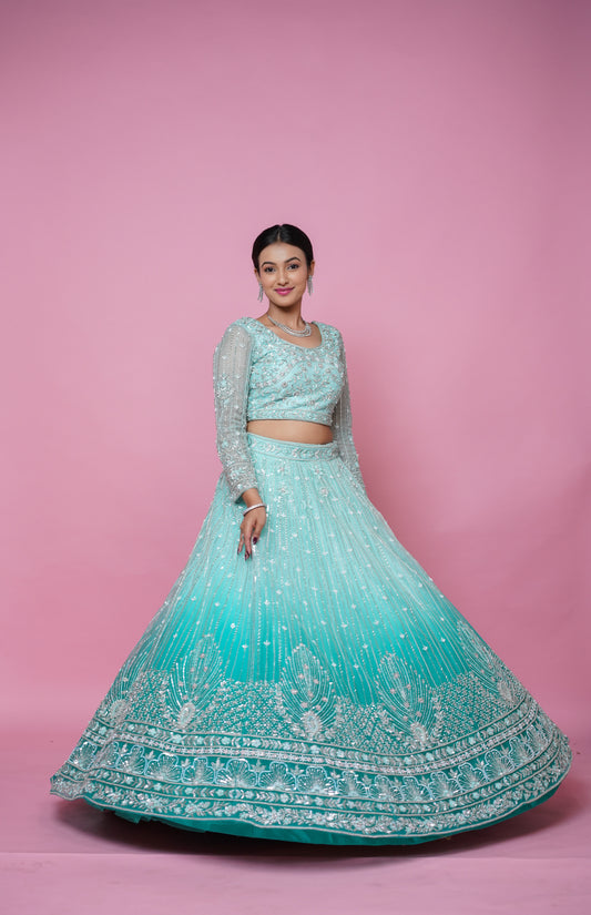 ombre green lehenga with handwork.