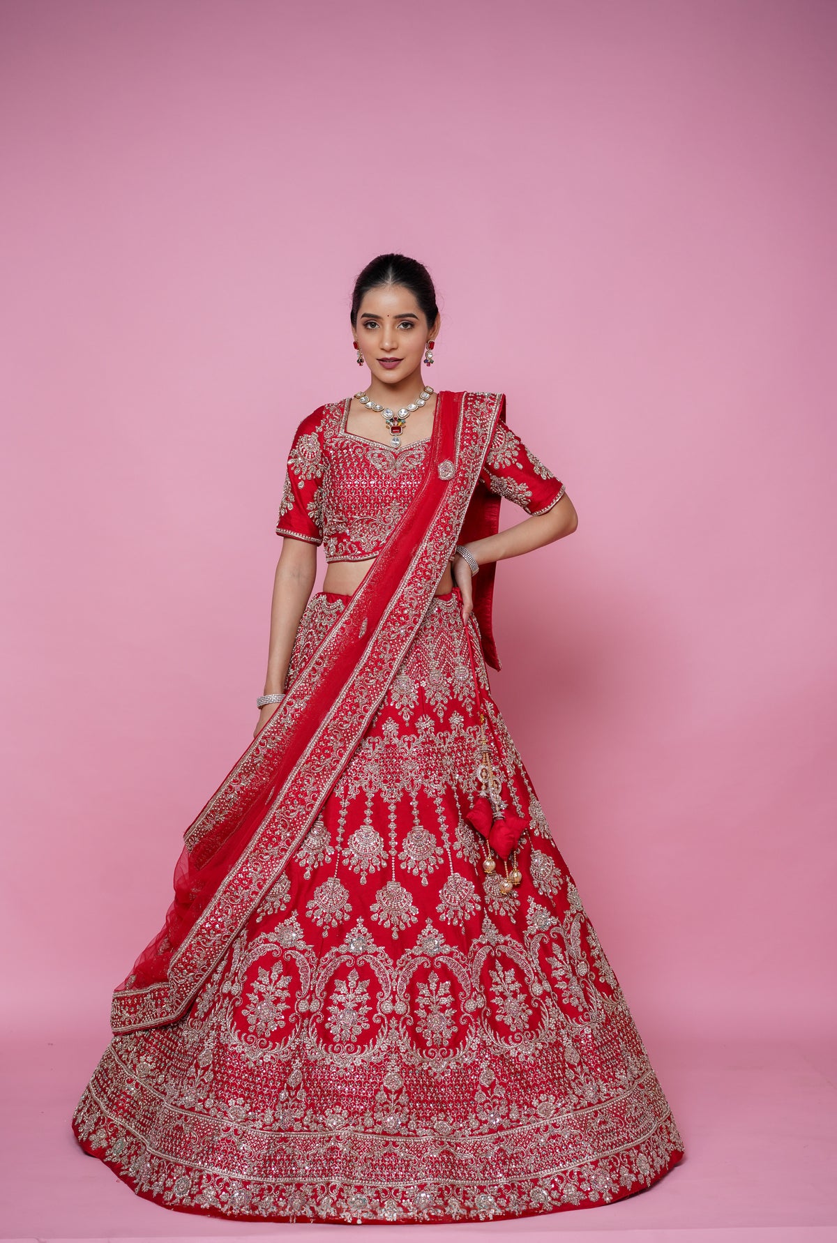 red silk fabric zardoshi lehenga.