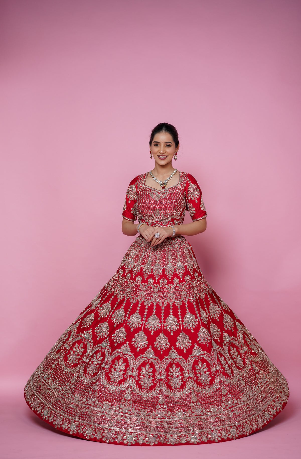 red silk fabric zardoshi lehenga.