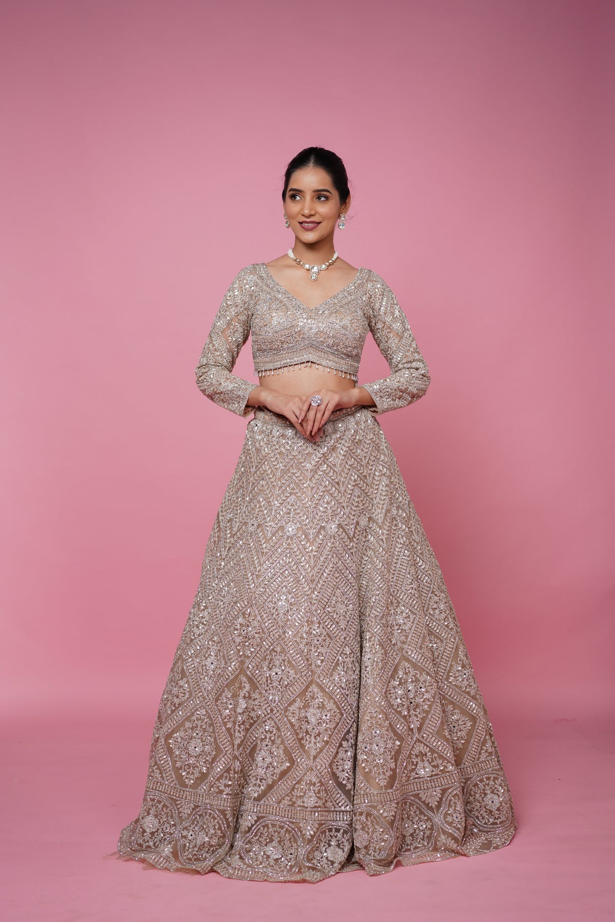 beige gold lehenga best suited for engagement and recpetion function