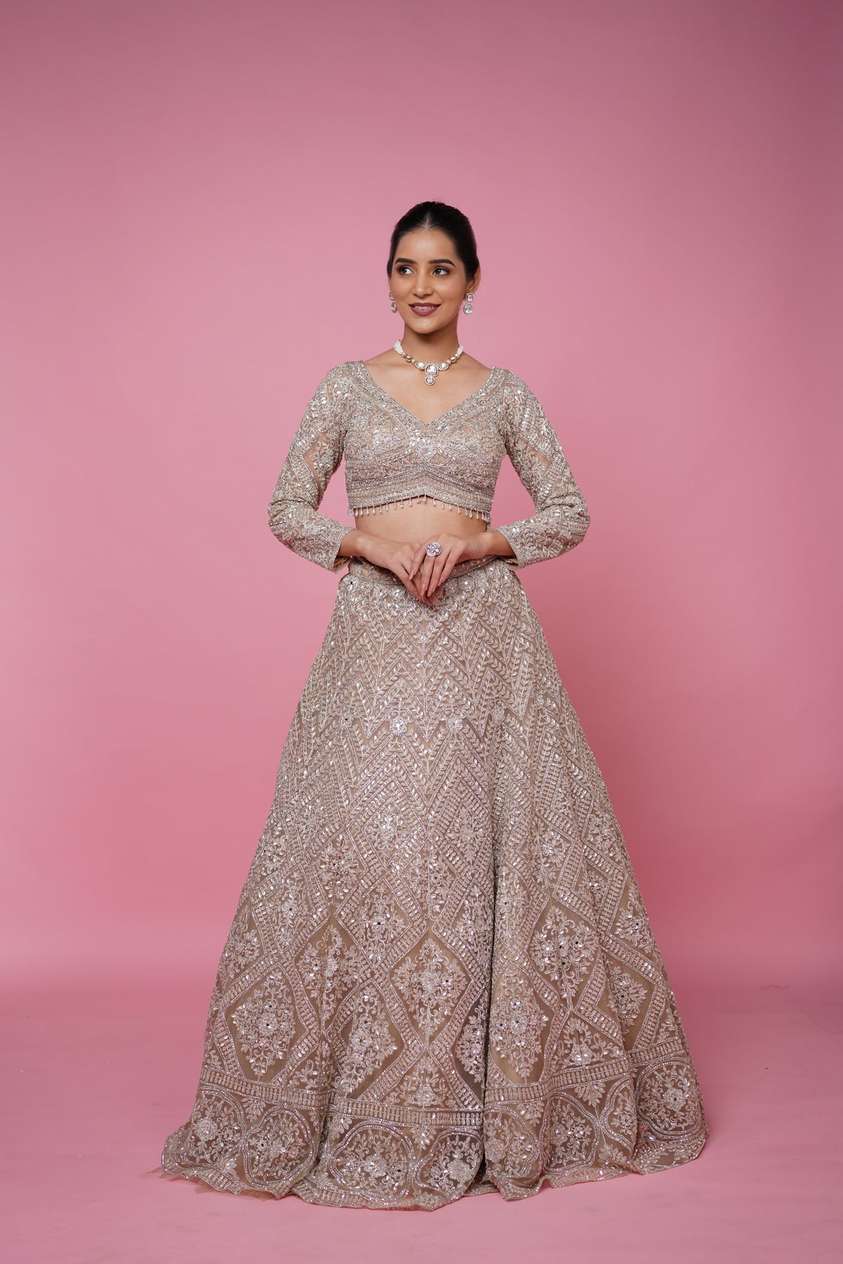 beige gold lehenga best suited for engagement and recpetion function