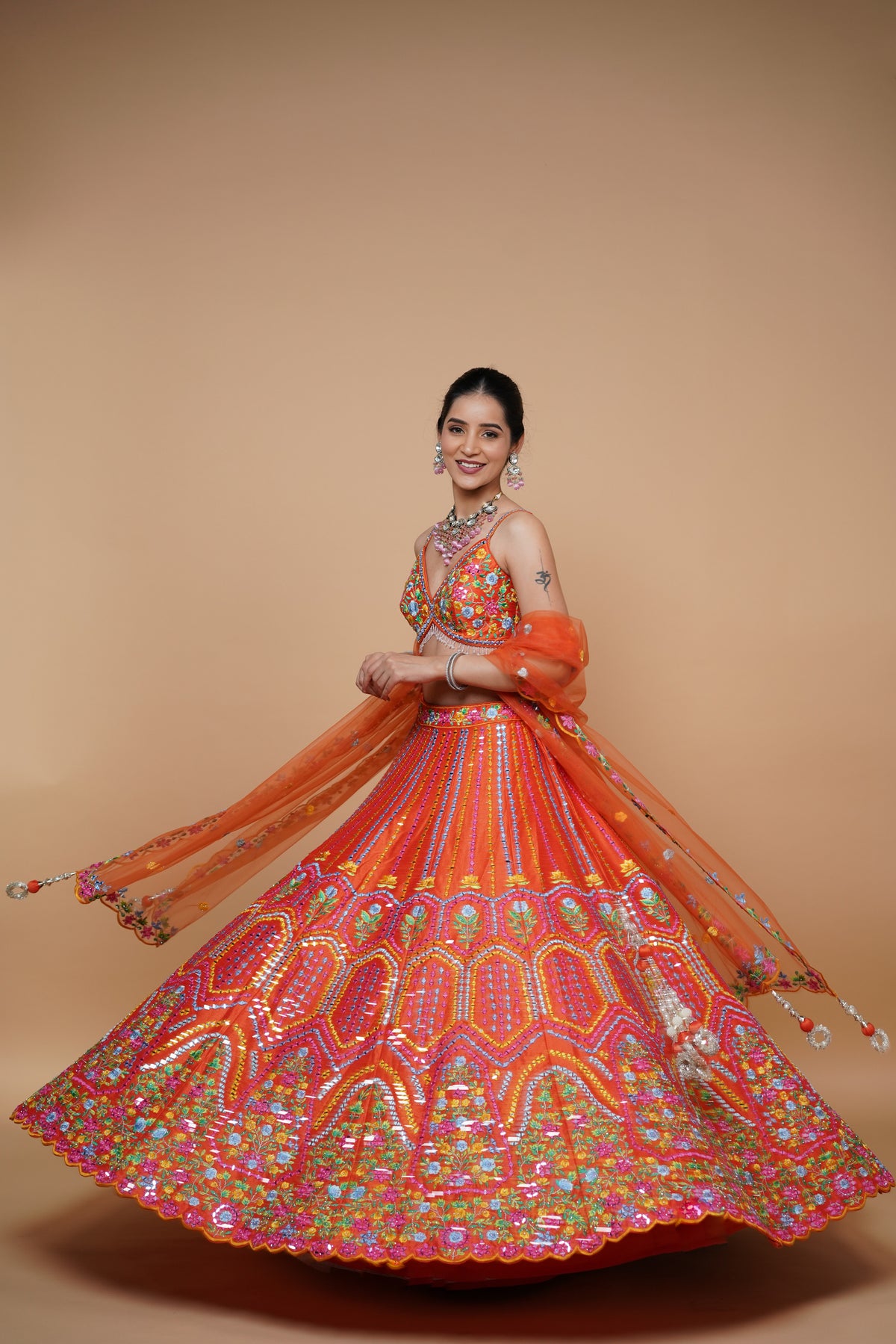 rust colour lehenga with mirror work and designer blouse design and net dupatta