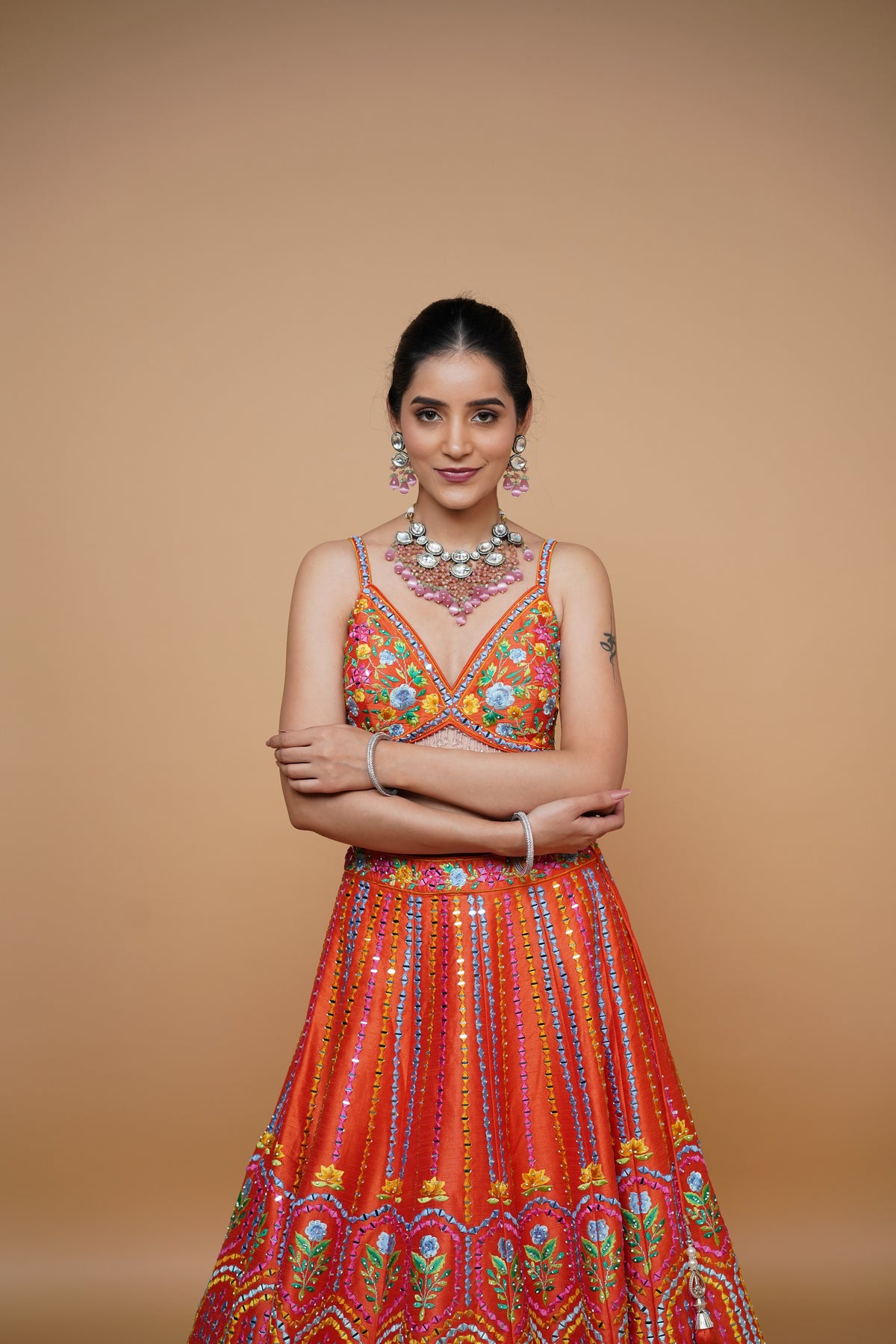 rust colour lehenga with mirror work and designer blouse design and net dupatta