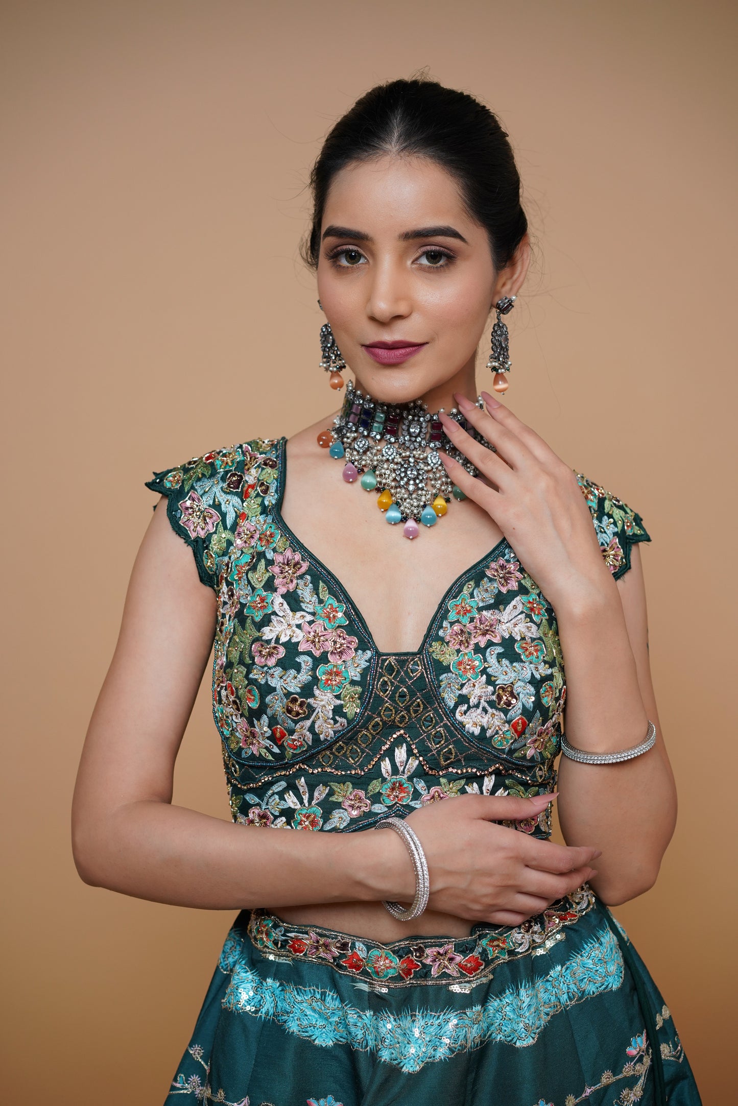 green carnival theme bridal lehenga with designer blouse design.