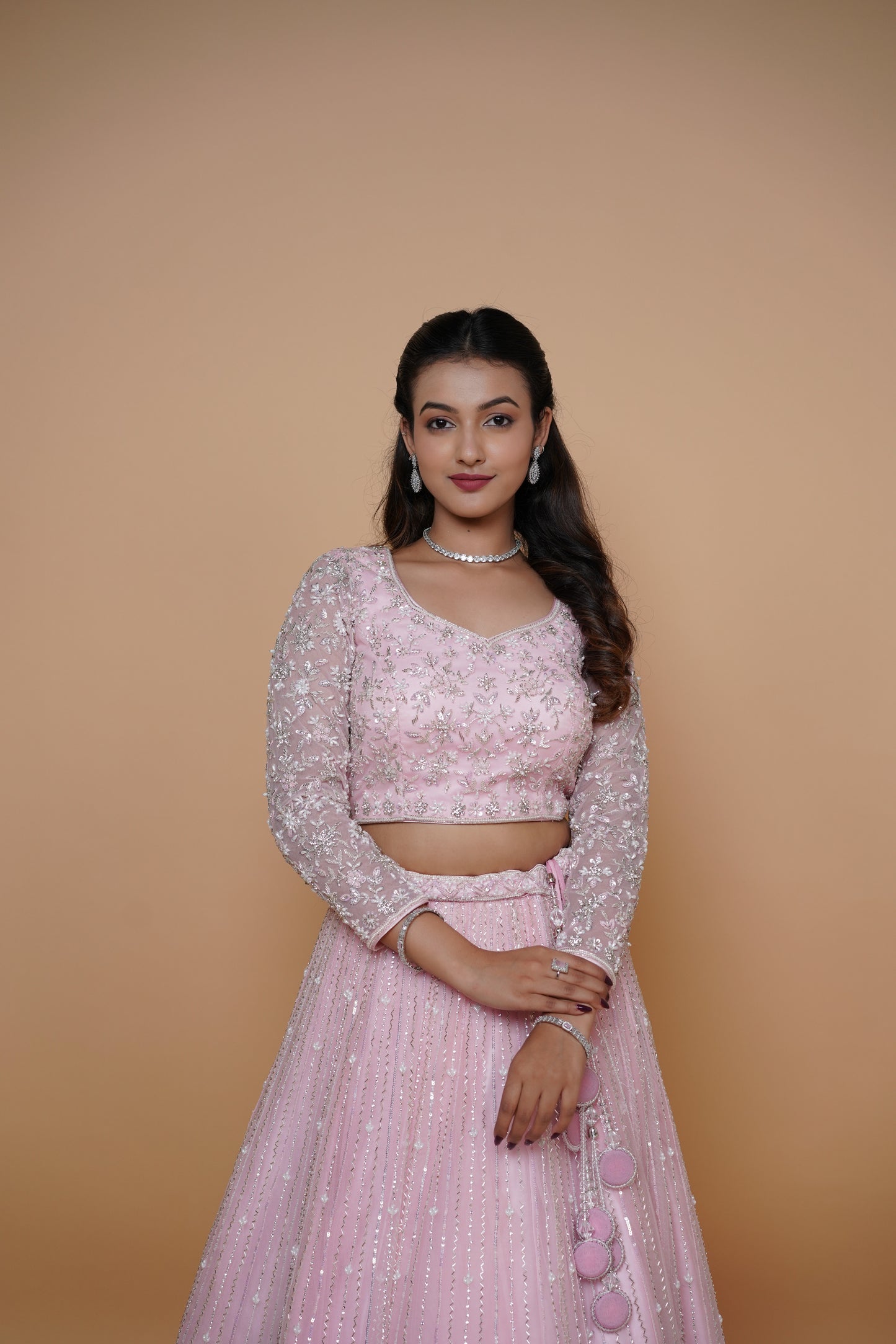 hand work pink lenega with elegant design best suited for reception.