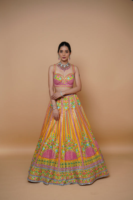 mustard yellow lehenga design with handwork and designer touch.