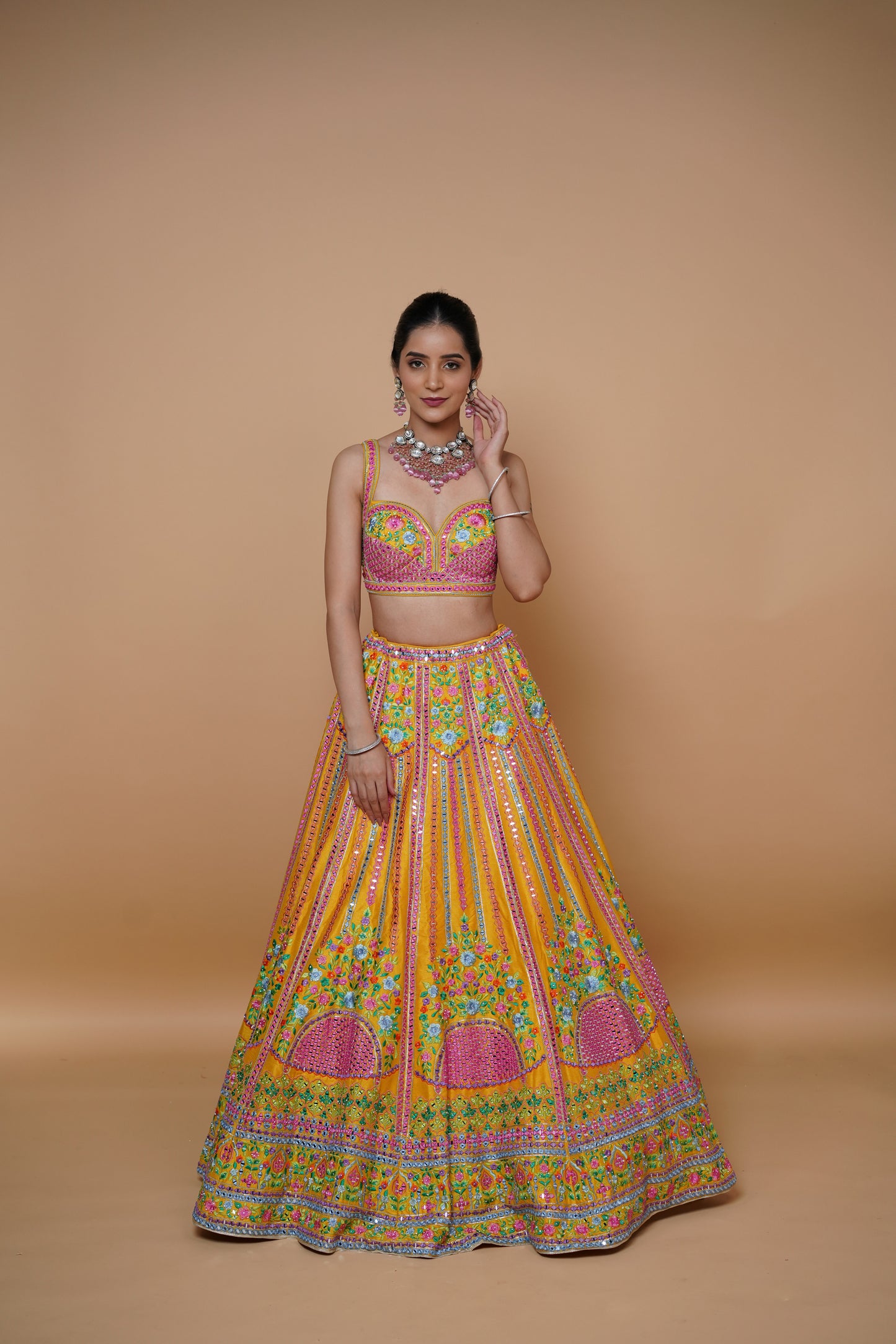 mustard yellow lehenga design with handwork and designer touch.
