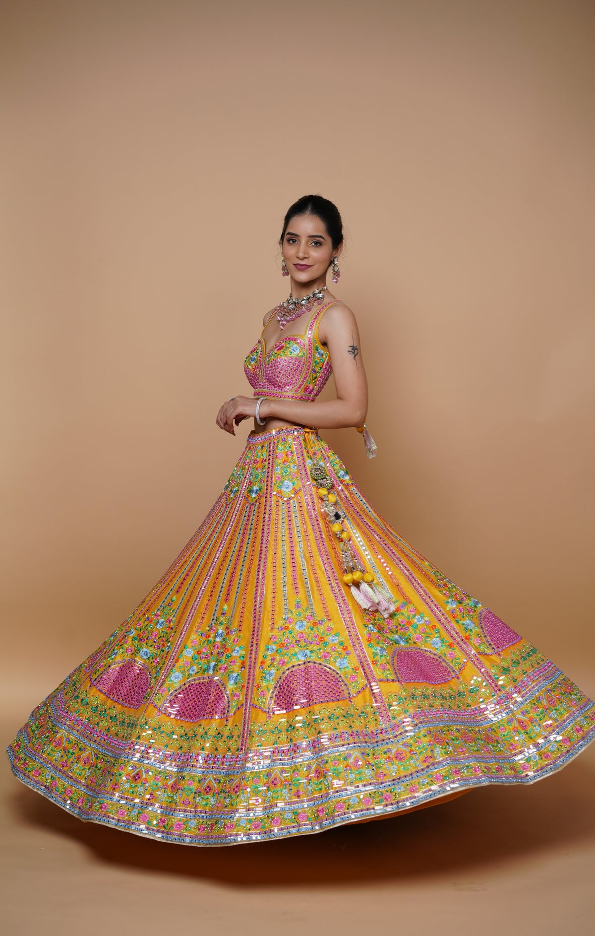 mustard yellow lehenga design with handwork and designer touch.