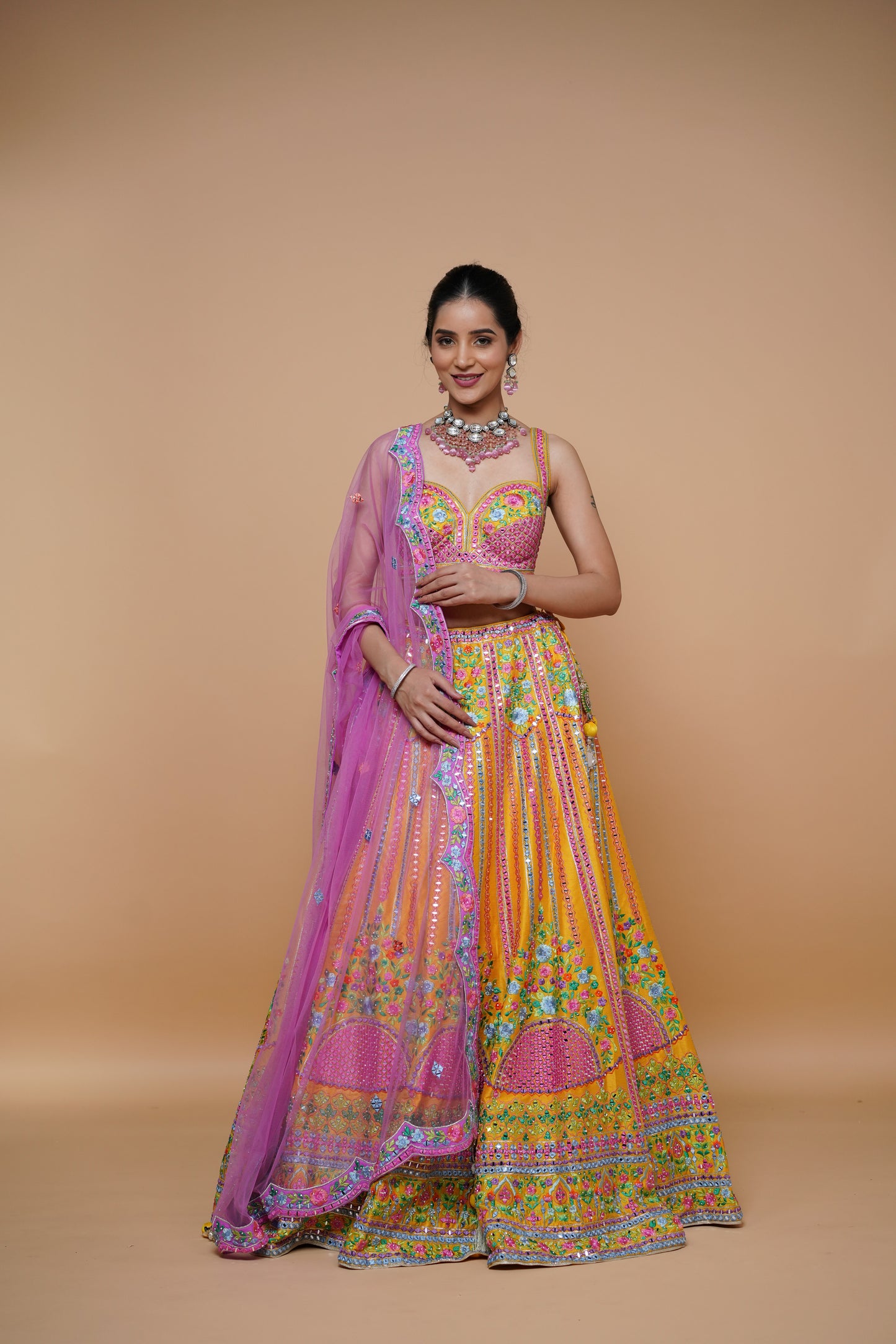 mustard yellow lehenga design with handwork and designer touch.