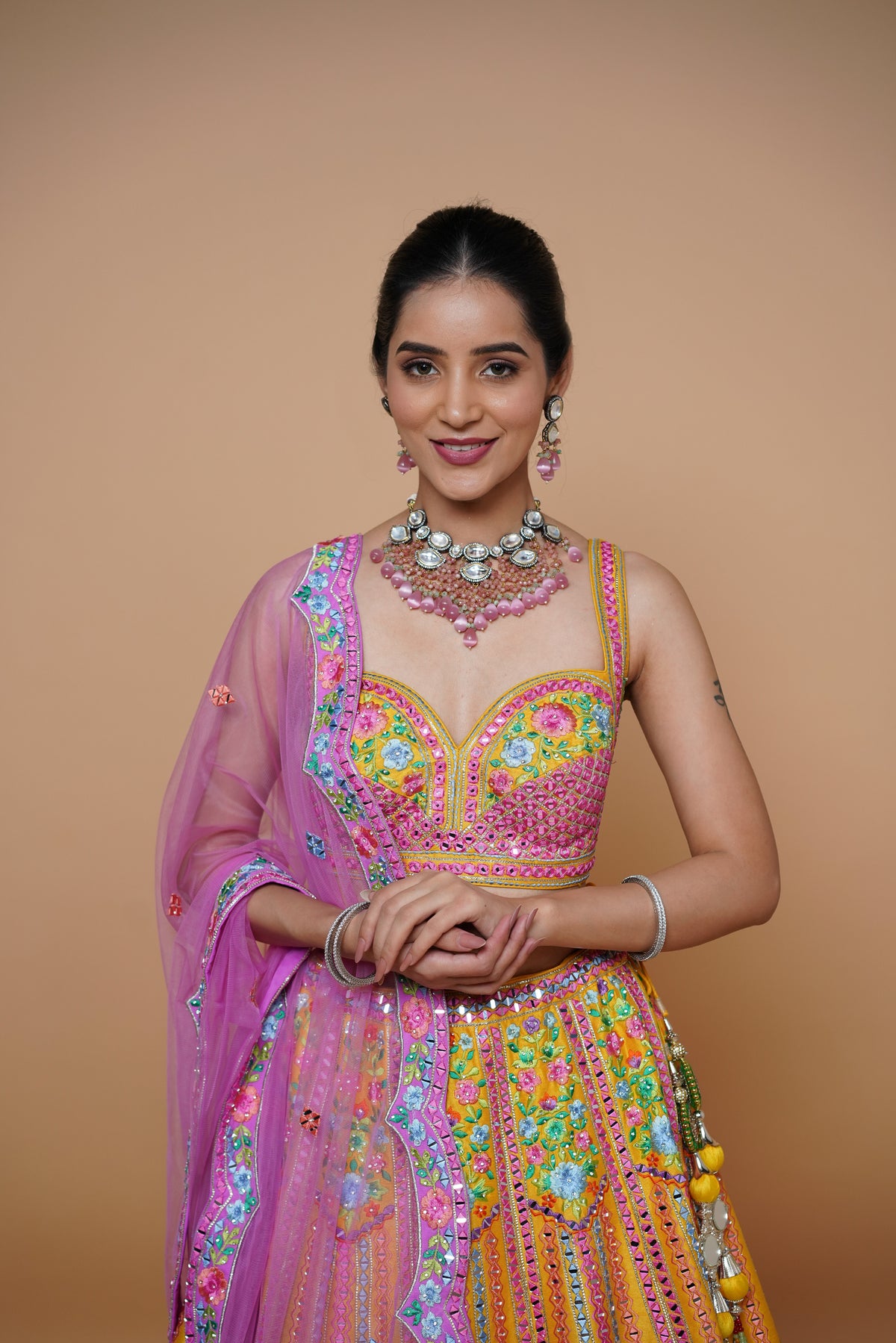 mustard yellow lehenga design with handwork and designer touch.