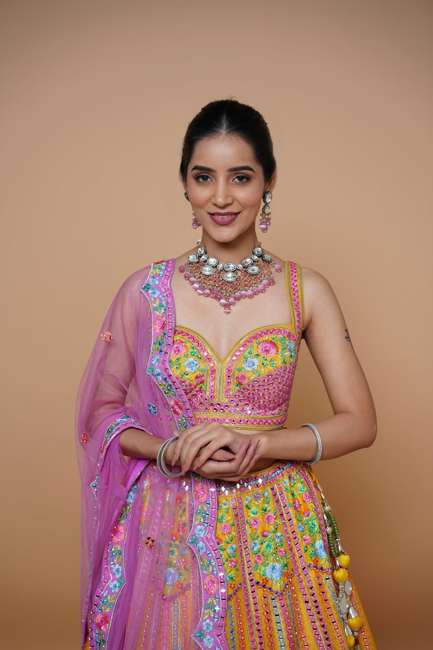 mustard yellow lehenga design with handwork and designer touch.