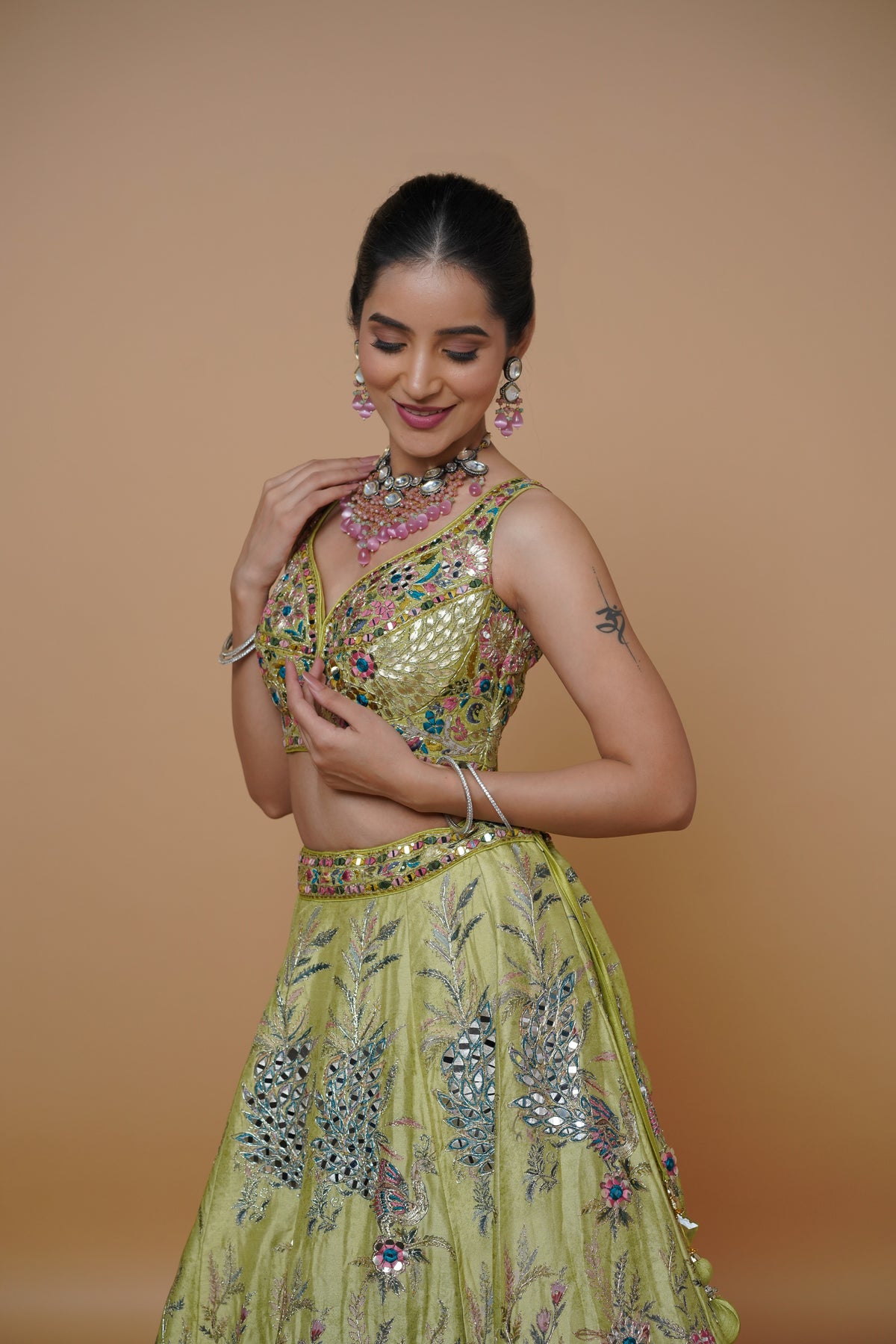 carnival theme designer green lehenga with heavy fabric and print.