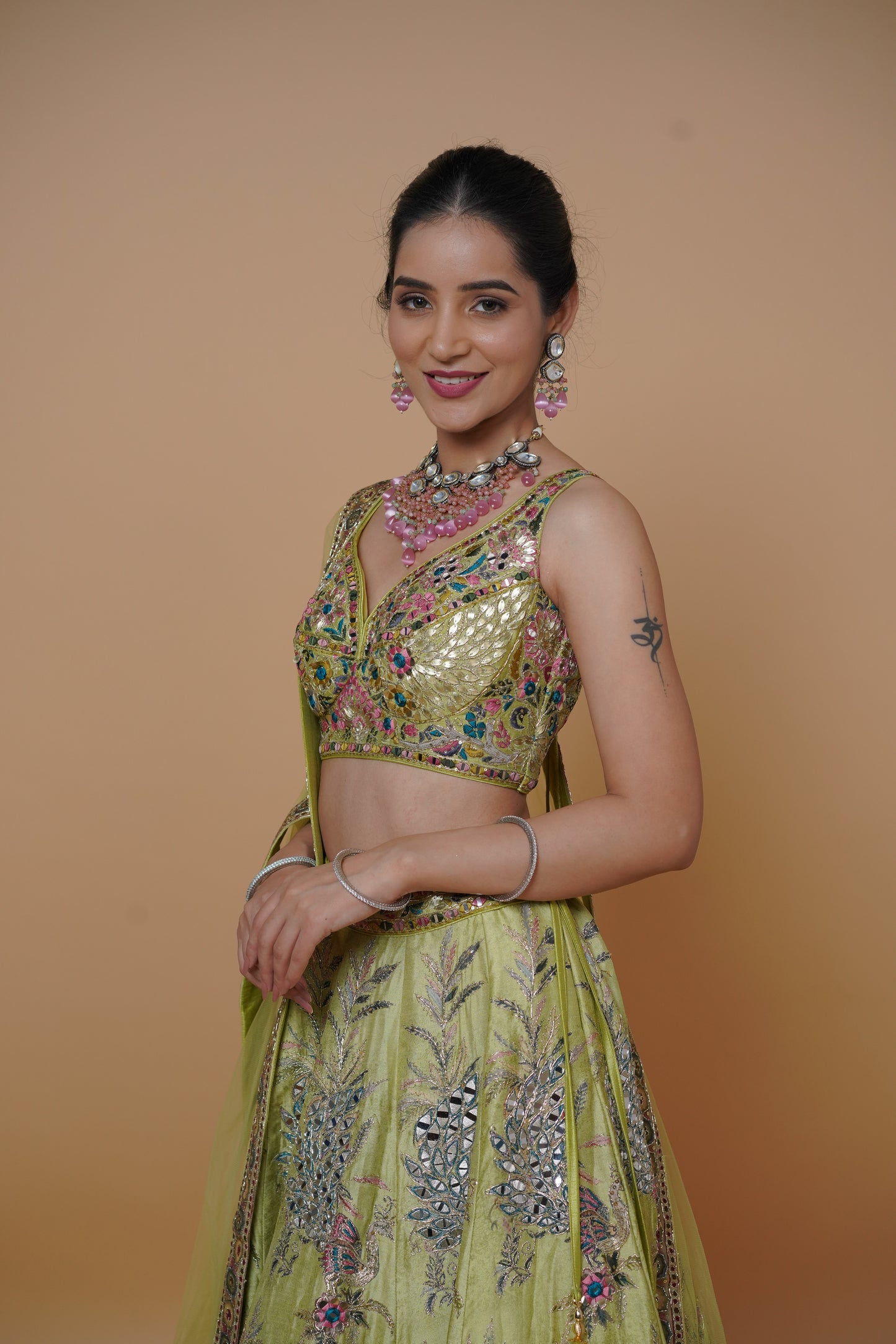 carnival theme designer green lehenga with heavy fabric and print.