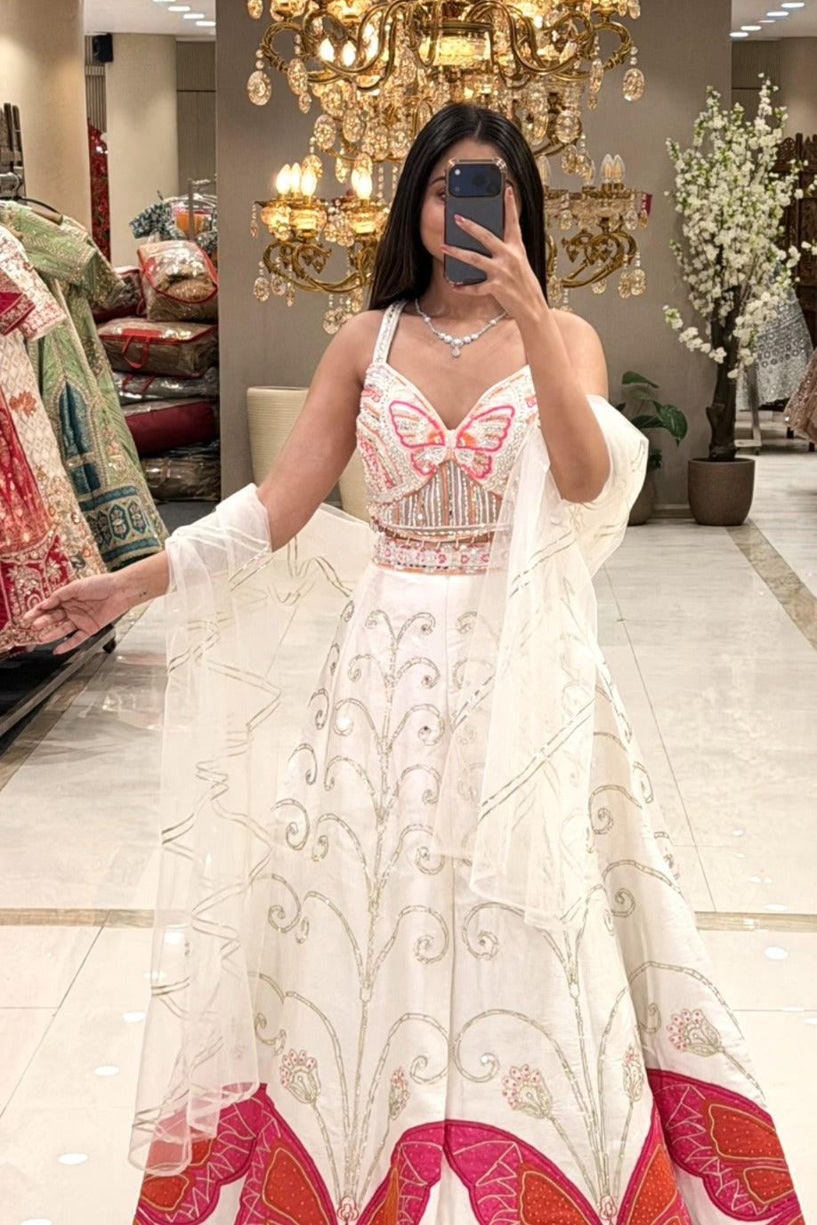 Ivory white butterfly lehenga set with silver zari scroll skirt and coral appliqué butterfly border — Urban Dulhaniya Pune