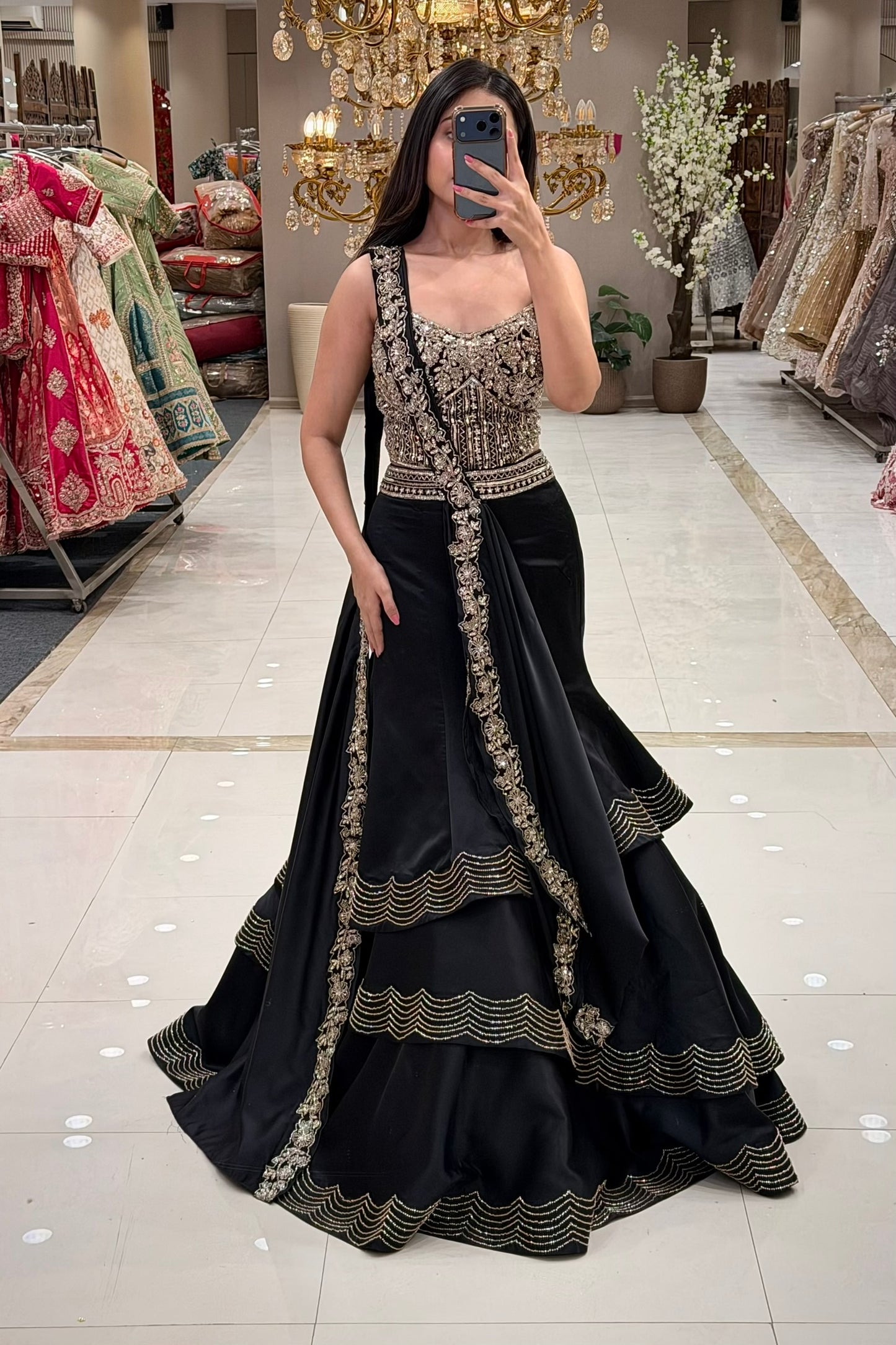 Best black lehenga in Pune for reception – gold zardozi corset blouse at Urban Dulhaniya Camp Pune
Black gold occasion wear lehenga for cocktail or reception – tiered skirt set at Urban Dulhaniya Pune