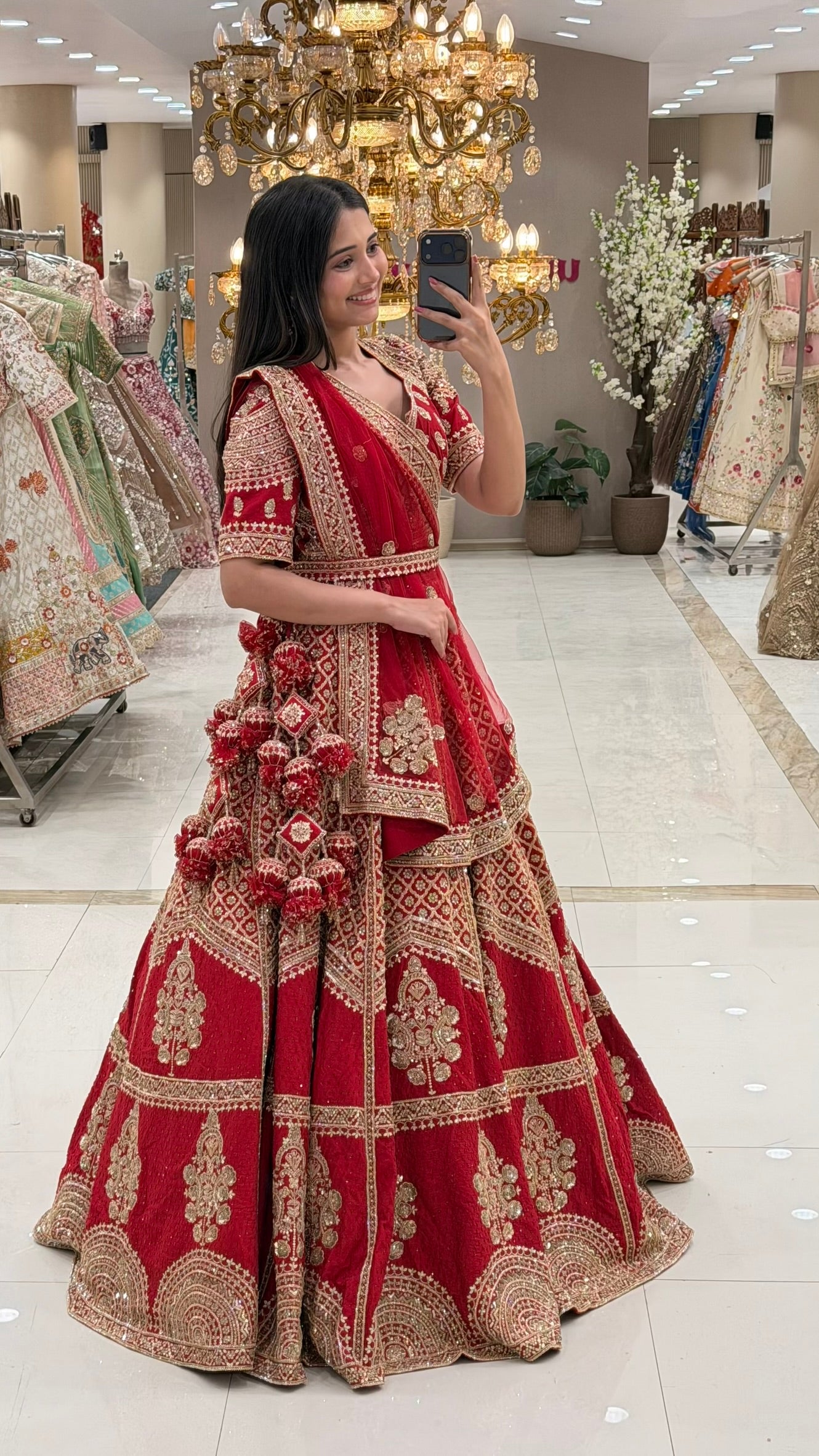 Red bridal lehenga shop Pune MG Road Camp – traditional gold zardozi set at Urban Dulhaniya Oswal Plaza