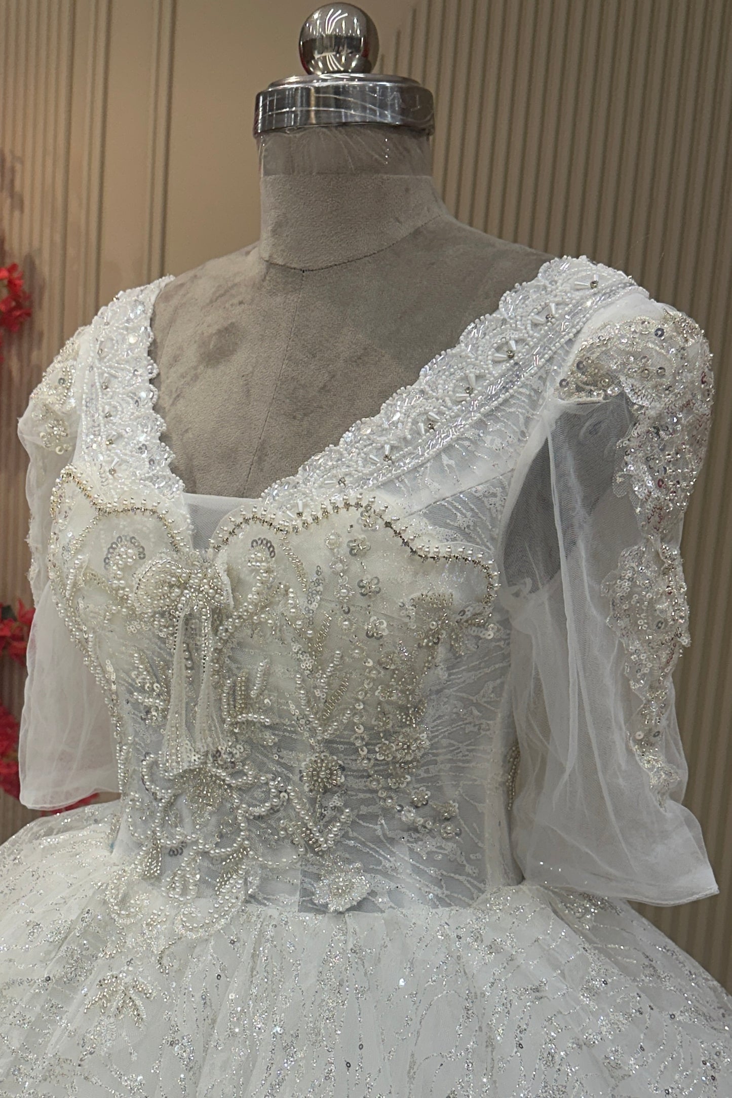Angled bust detail off white net pearl cutdana ballgown designer bridal wear at Urban Dulhaniya Pune