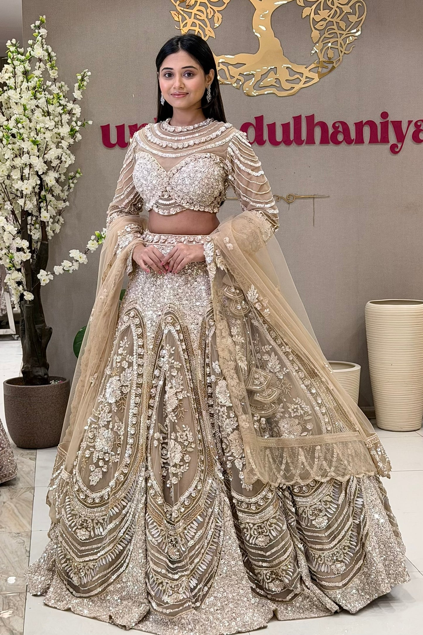 Best bridal lehenga boutique in Pune – champagne gold couture set with pearl cage blouse at Urban Dulhaniya
Indian wedding bridal lehenga for destination wedding – champagne pearl cage set at Urban Dulhaniya Pune