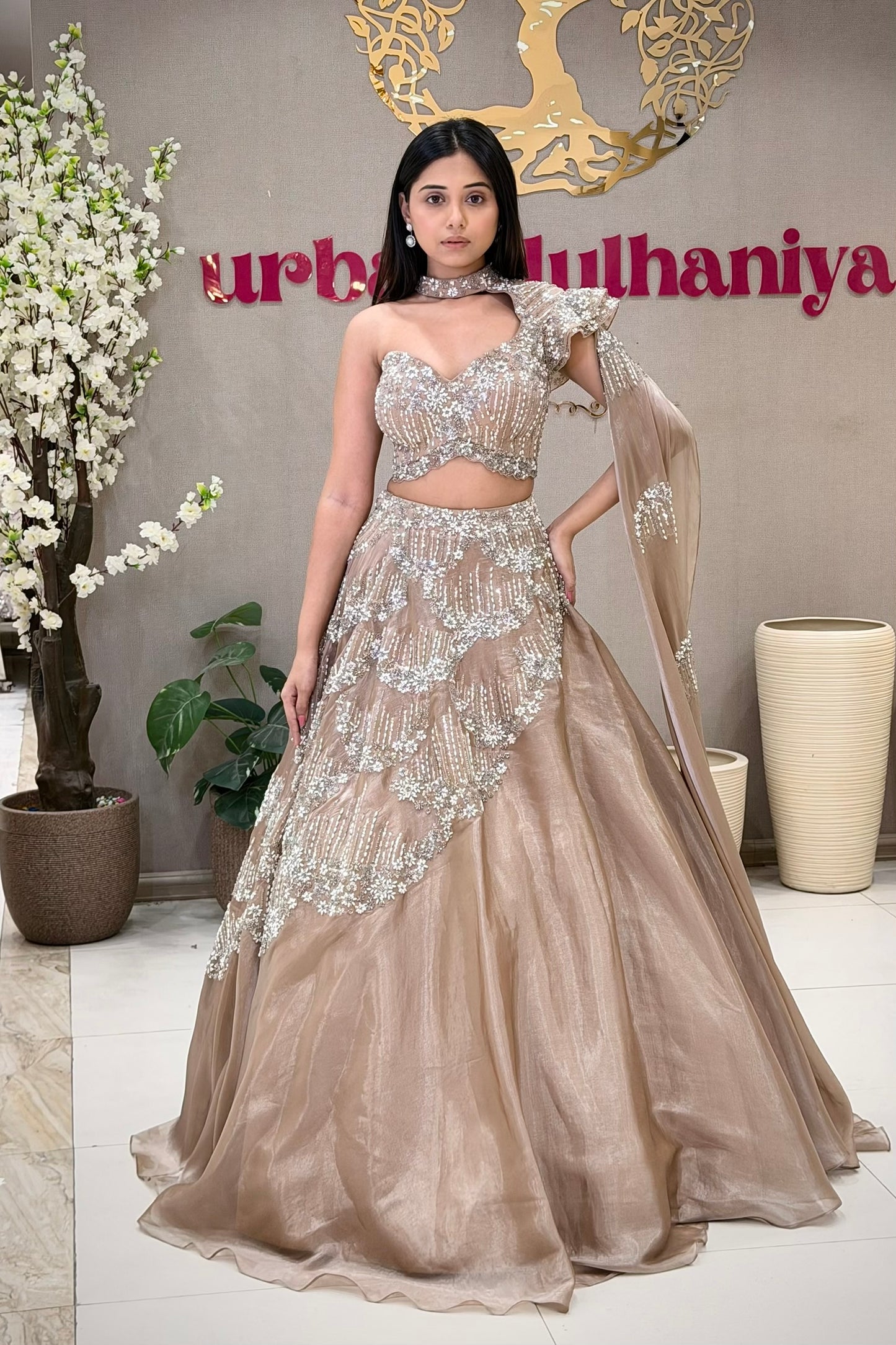 Best nude lehenga in Pune – one-shoulder choker blouse with pearl handwork at Urban Dulhaniya