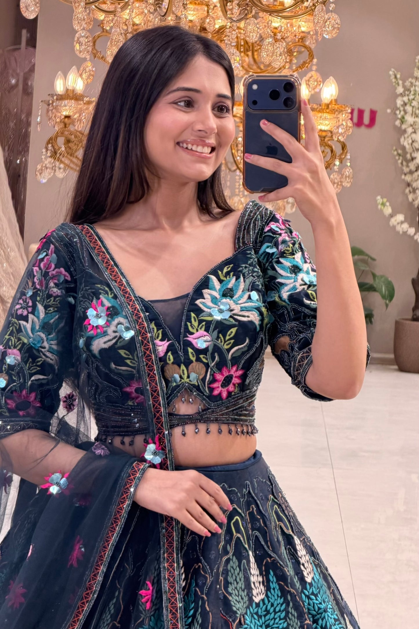 Best navy lehenga in Pune with multicolour garden embroidery – Urban Dulhaniya MG Road boutique
Navy blue reception lehenga with multicolour botanical embroidery – Urban Dulhaniya Camp Pune