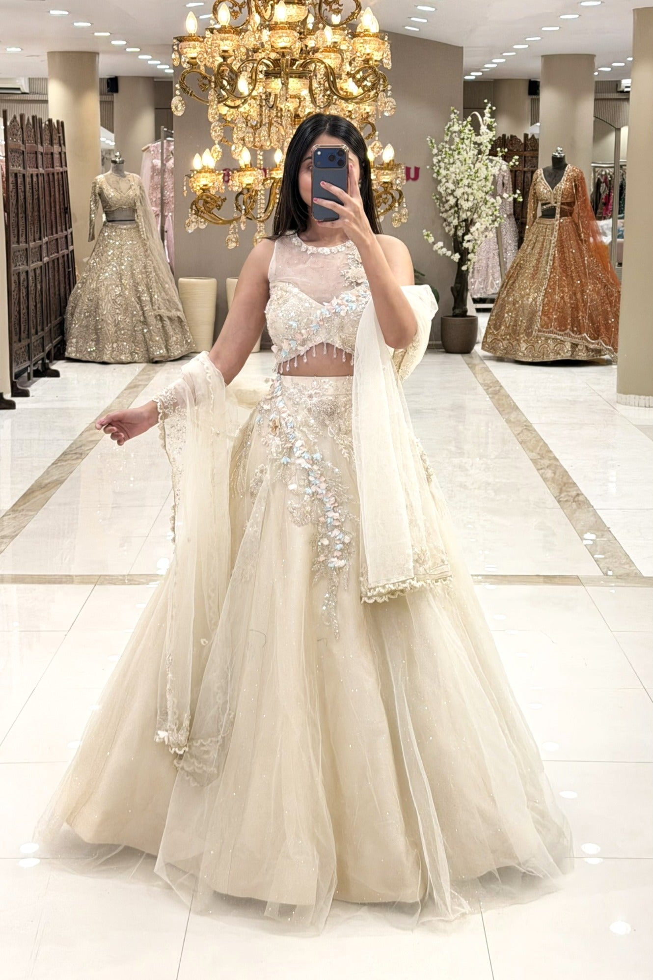 Full length ivory lehenga set with illusion neckline blouse and voluminous net skirt – Urban Dulhaniya