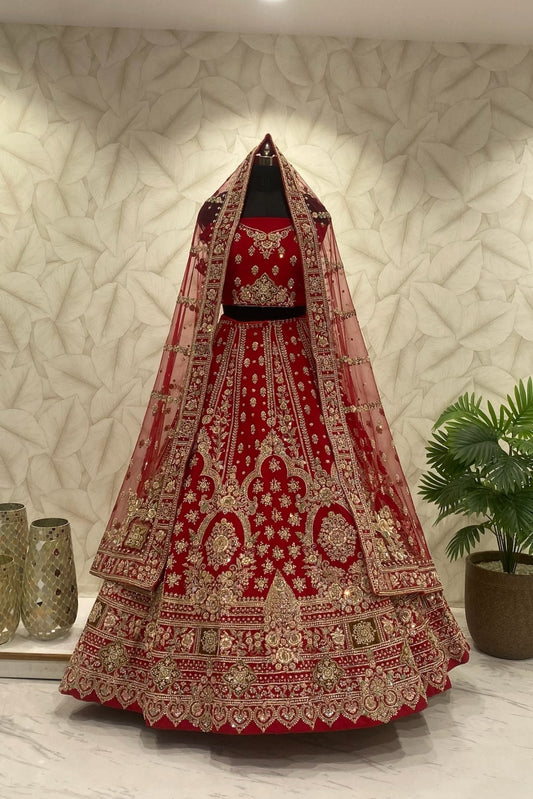 Red pure zardoshi bridal lehenga with jaal dupatta