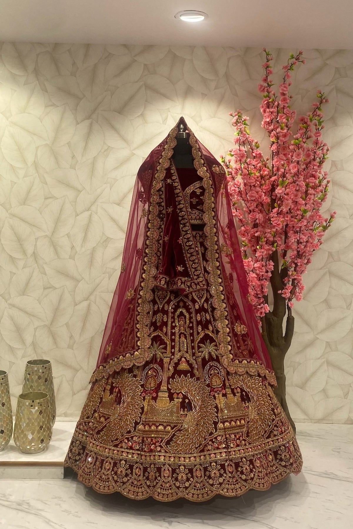 Maroon Bridal Lehenga with big peacock Motif design with double dupatta