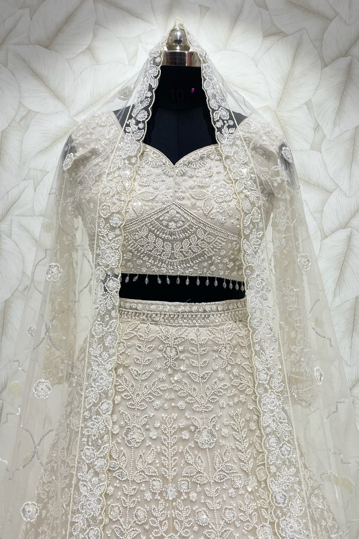 Ivory Dream Lehenga in heavy beads and cutdana work