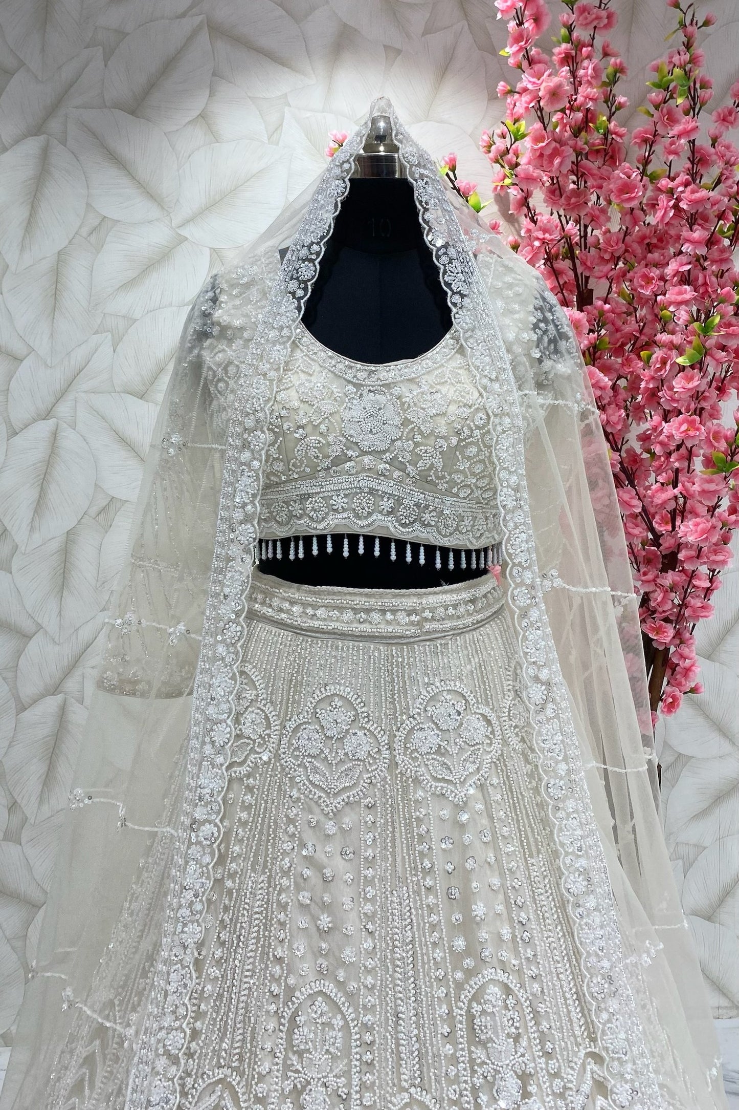 Ivory Dream Lehenga second design  in heavy beads and cutdana work